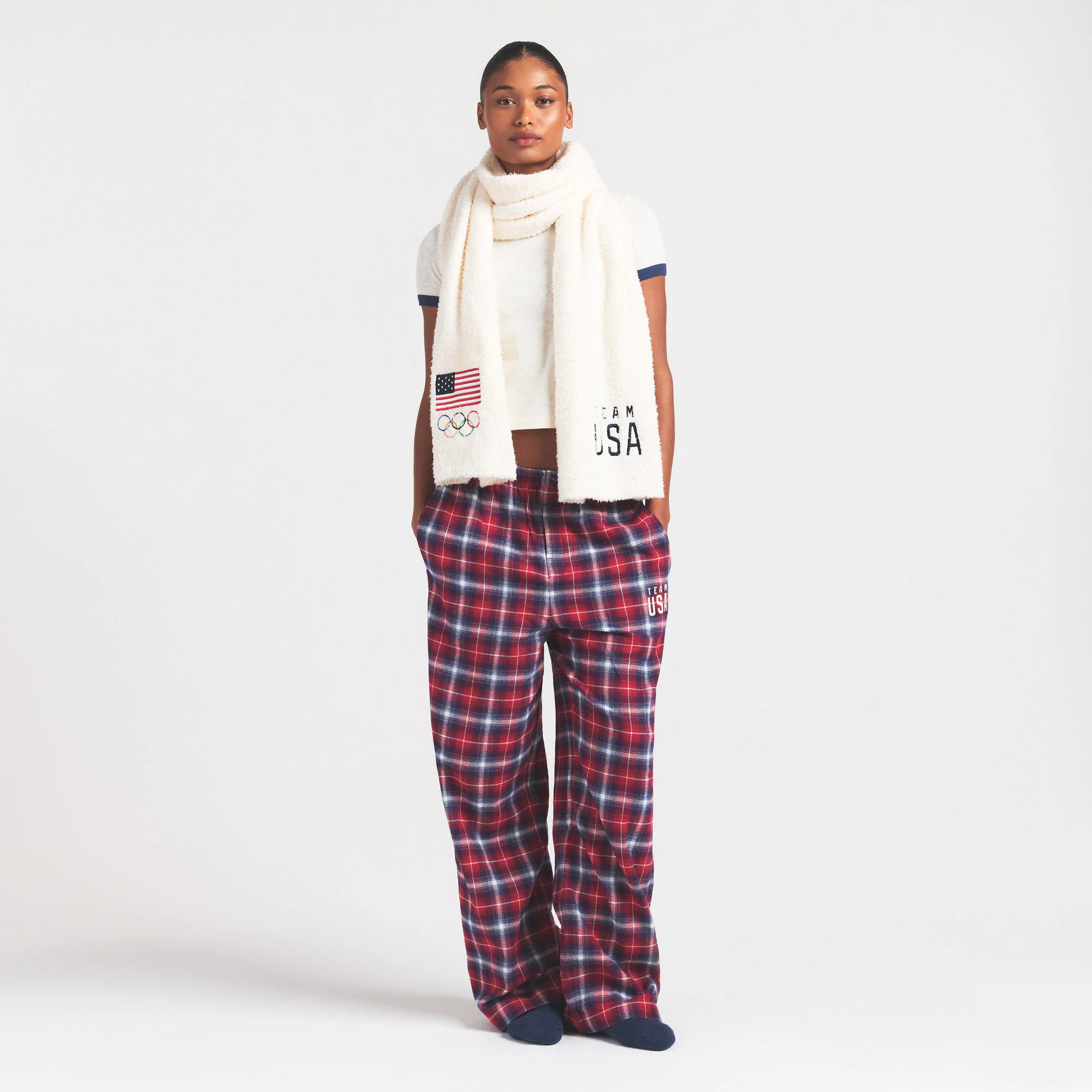 SKIMS FOR TEAM USA COZY OLYMPIC SCARF | ECRU ON A MODEL FRONT VIEW @ | FOCUS: 0.0, 1.0, 0.9