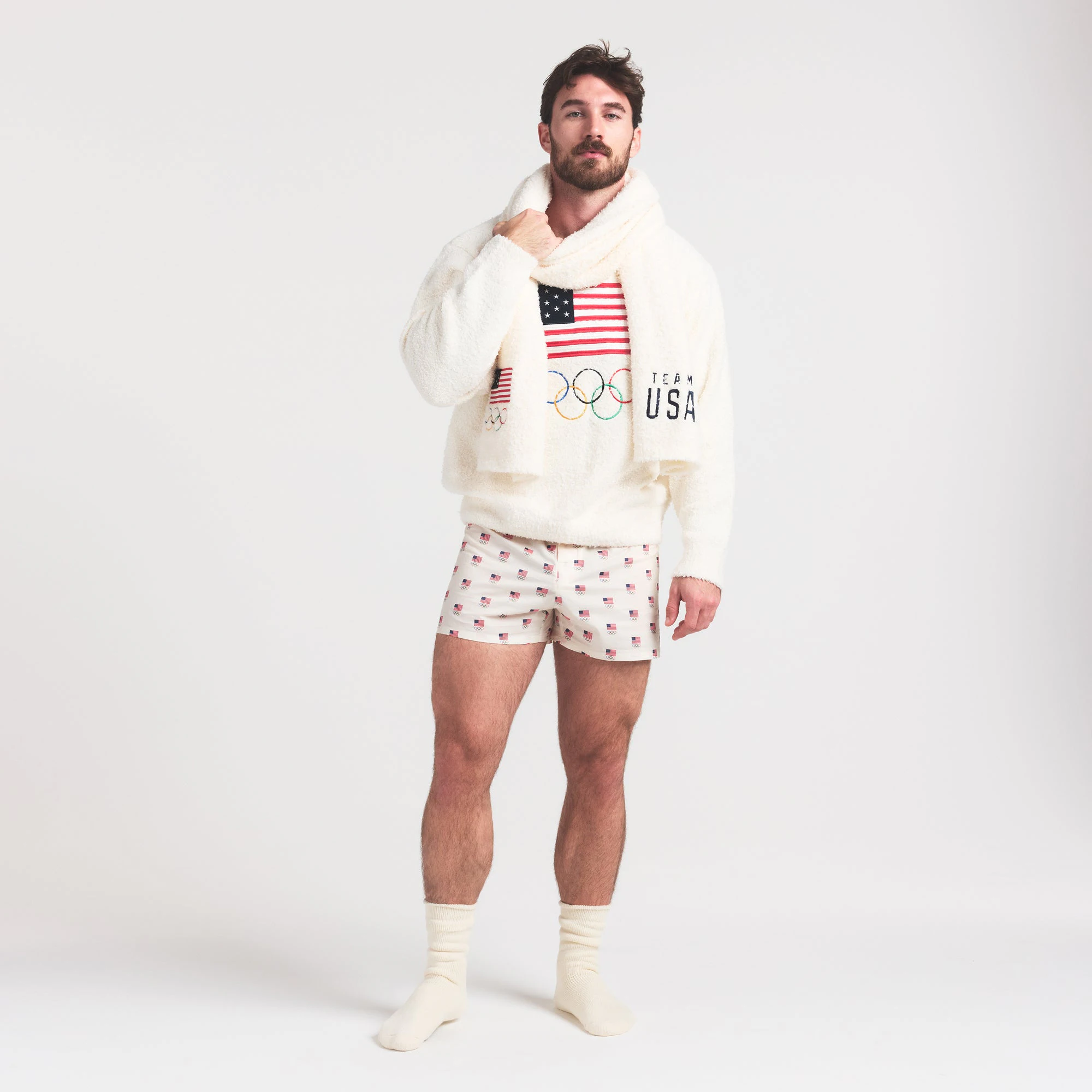 SKIMS FOR TEAM USA COZY OLYMPIC SCARF | ECRU ON A MODEL FRONT VIEW @ | FOCUS: 0.0, 1.0, 0.9