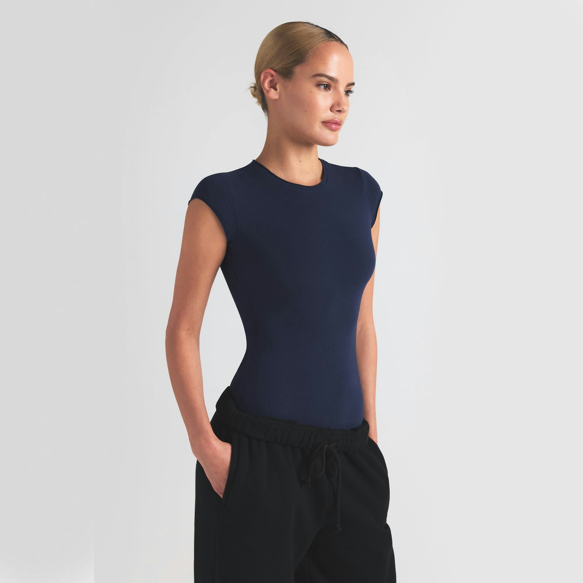 COTTON JERSEY T-SHIRT BRIEF BODYSUIT | NAVY ON A MODEL SIDE VIEW | FOCUS: 0.0, 1.0, 0.9