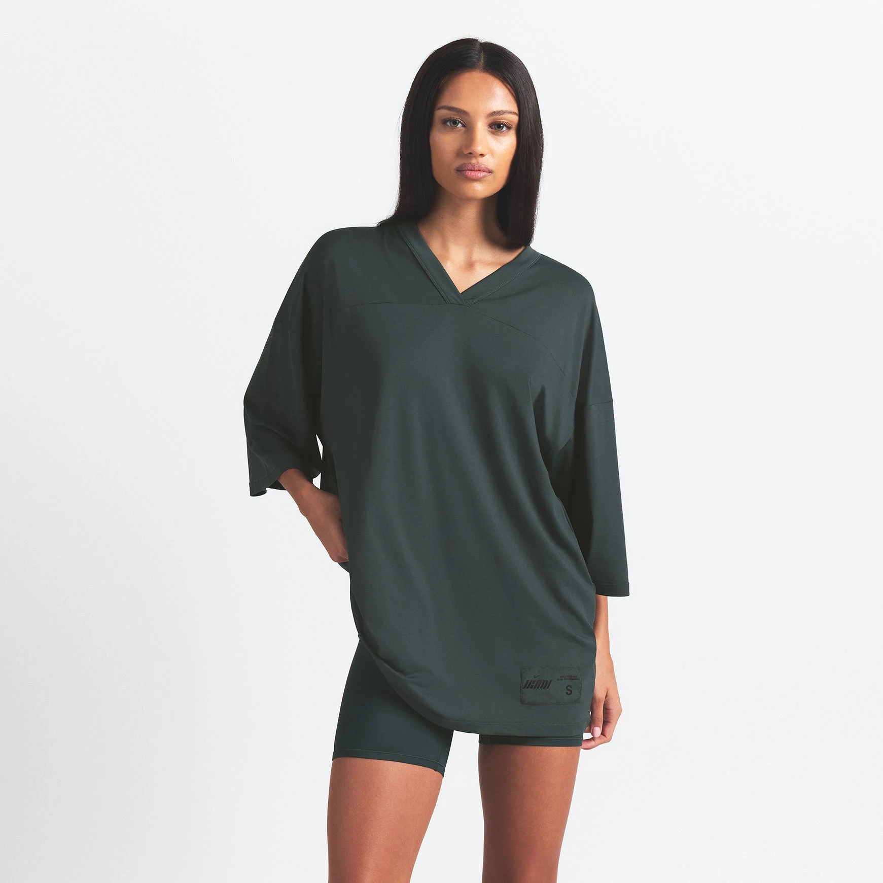 NikeSKIMS AIRY V-NECK OVERSIZED TOP | DARK TEAL ON A MODEL SIDE VIEW @ | FOCUS: 0.0, 1.0, 0.9