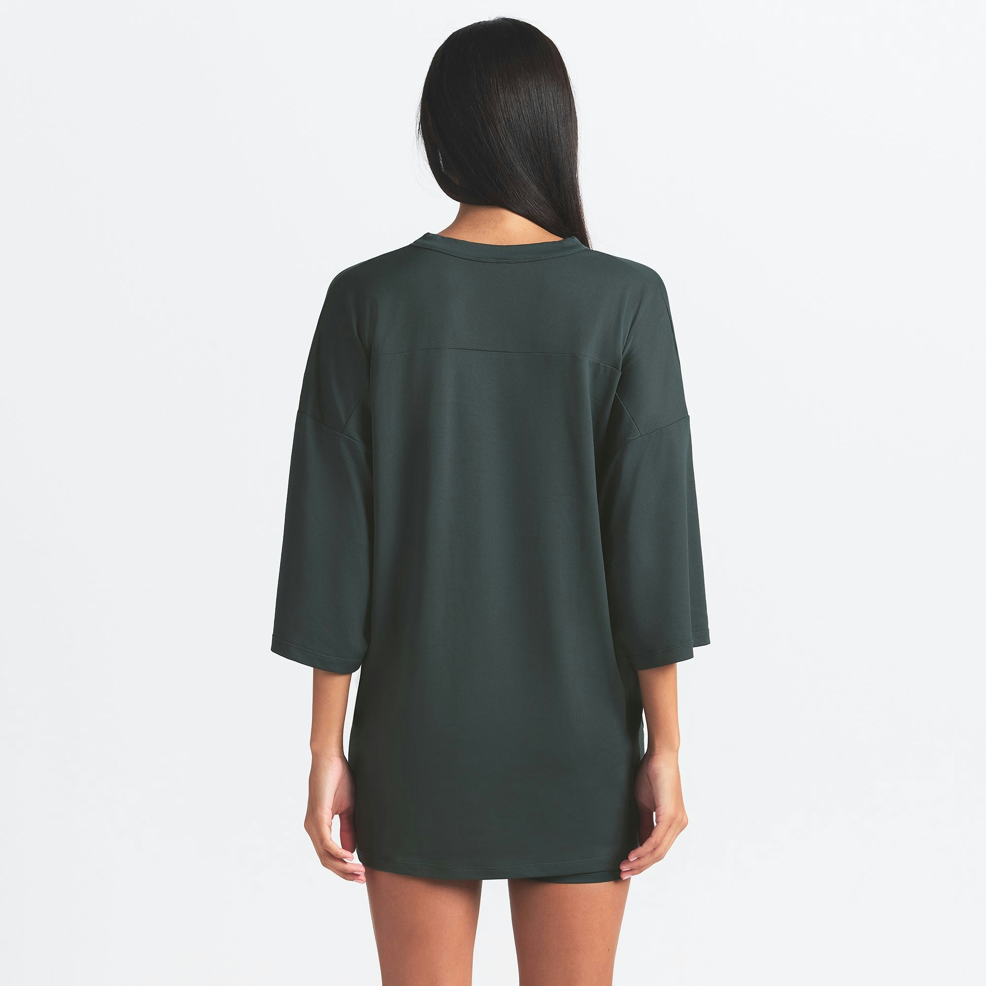 NikeSKIMS AIRY V-NECK OVERSIZED TOP | DARK TEAL ON A MODEL SIDE VIEW @ | FOCUS: 0.0, 1.0, 0.9