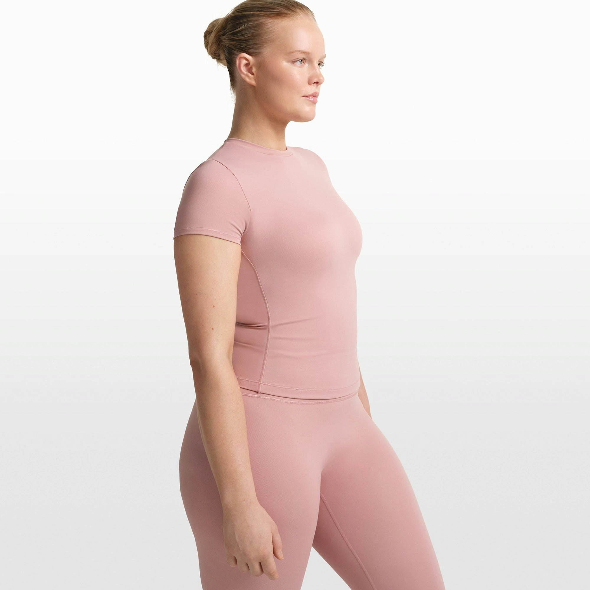 NikeSKIMS MATTE PADDED BABY TEE | HIMALAYAN ON A MODEL FRONT VIEW @ | FOCUS: 0.0, 1.0, 0.9