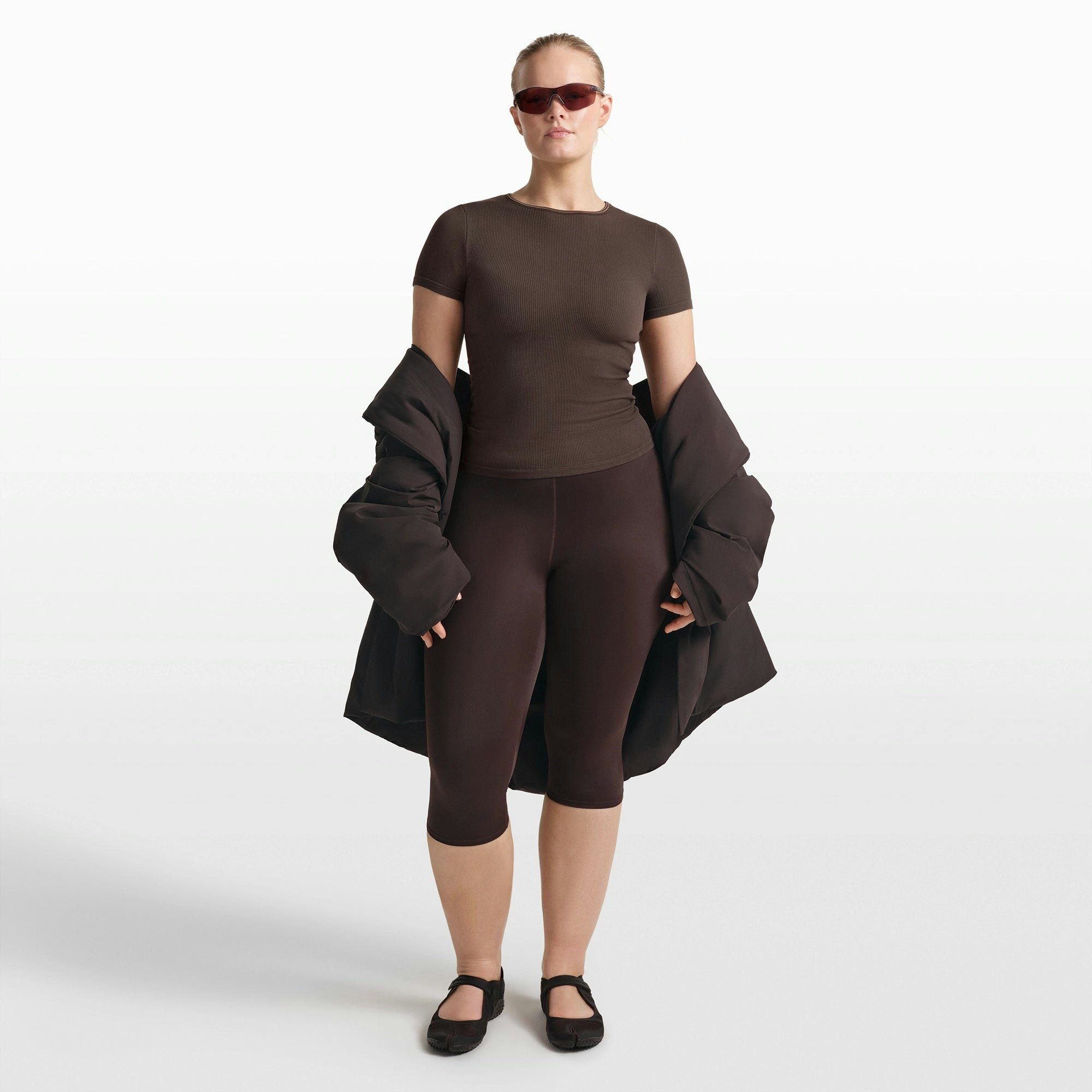 NikeSKIMS RIBBED SEAMLESS BABY TEE | PHOENIX/TRUFFLE ON A MODEL FRONT VIEW @ | FOCUS: 0.0, 1.0, 0.9