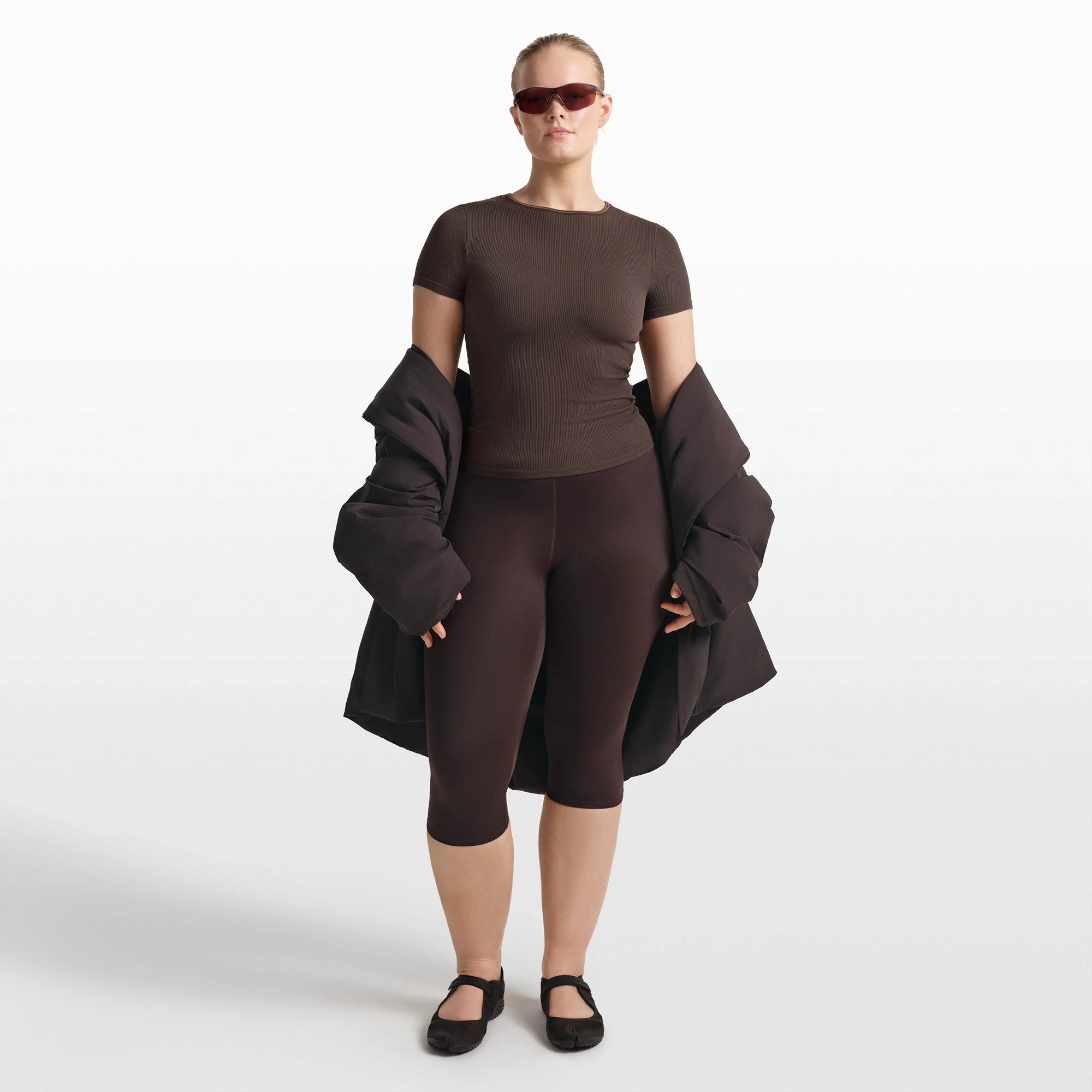 NikeSKIMS RIBBED SEAMLESS BABY TEE | PHOENIX/TRUFFLE ON A MODEL FRONT VIEW @ | FOCUS: 0.0, 1.0, 0.9