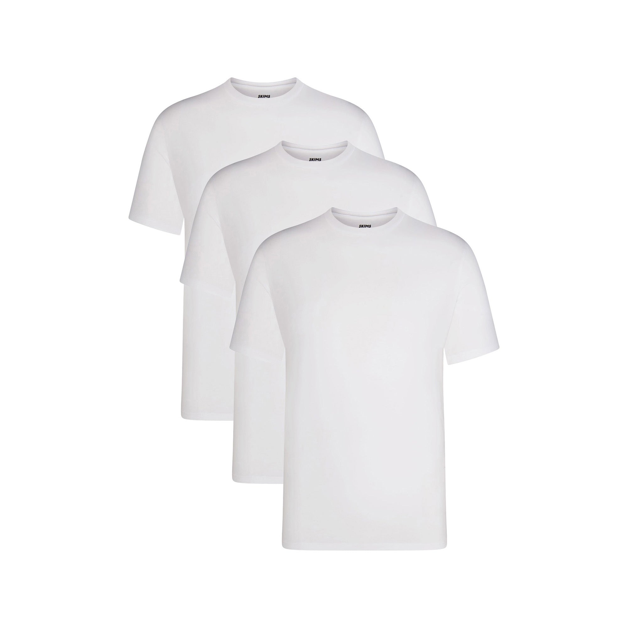 SKIMS BASICS MENS LIGHTWEIGHT T-SHIRT 3-PACK | CHALK ON A MODEL FRONT VIEW