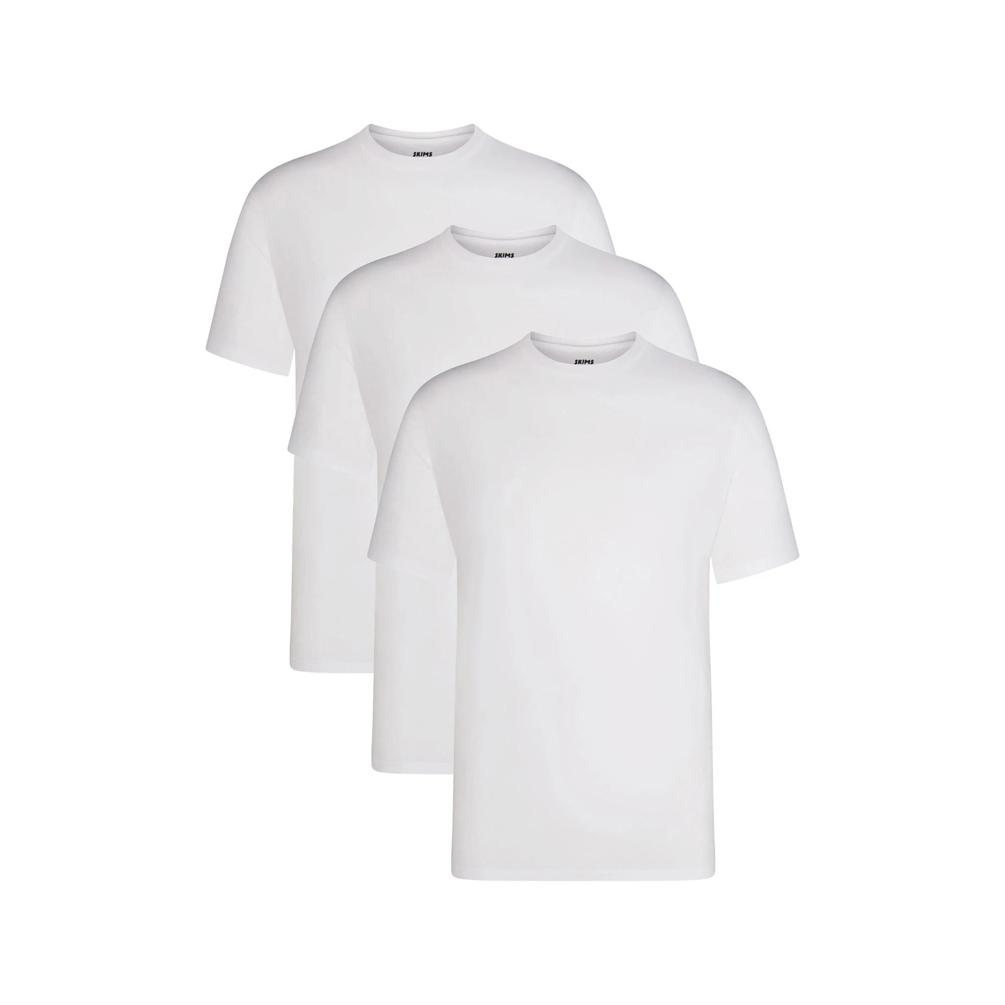 SKIMS BASICS MENS LIGHTWEIGHT T-SHIRT 3-PACK | CHALK ON A MODEL FRONT VIEW