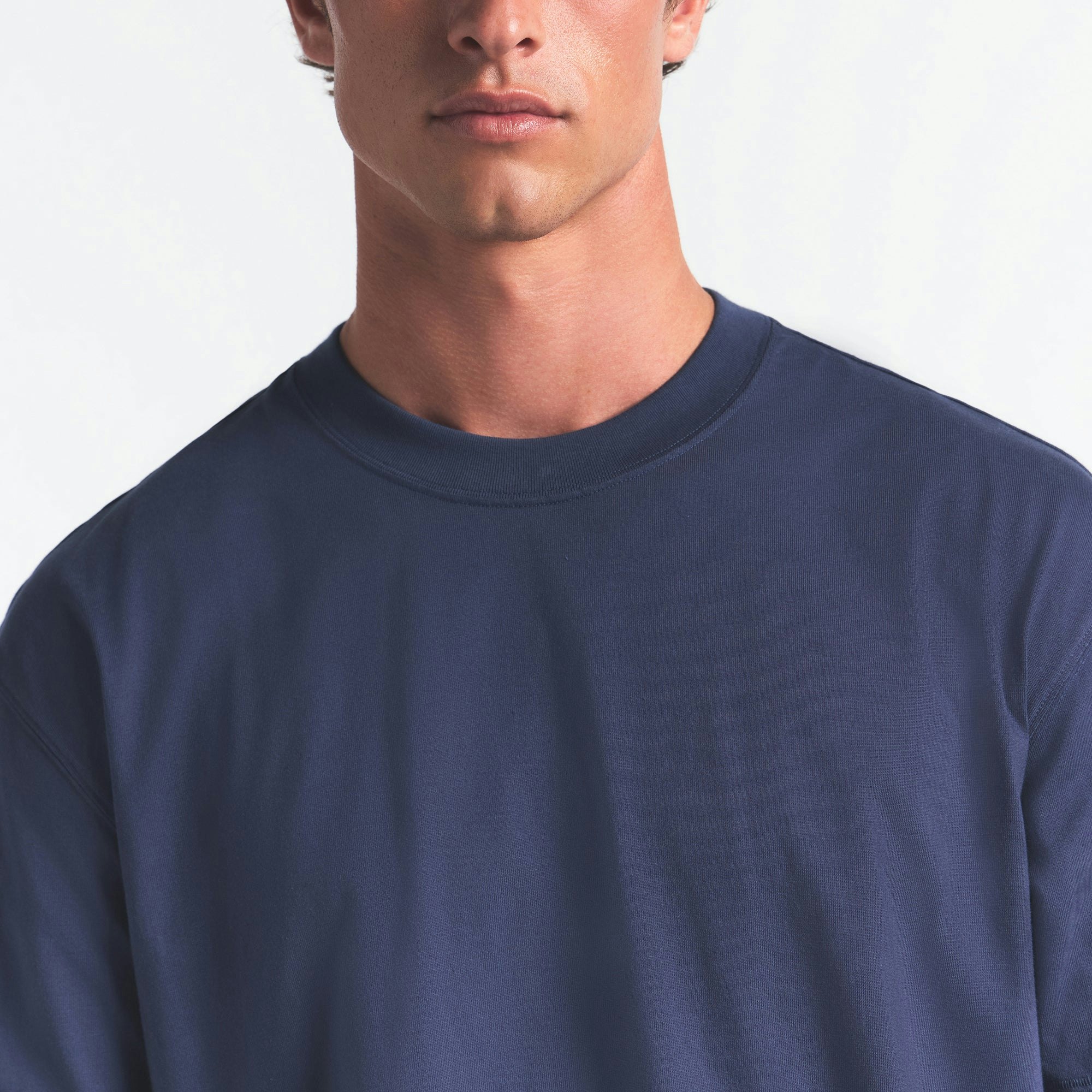 HEAVYWEIGHT COTTON MENS RELAXED T-SHIRT | DAMSON ON A MODEL FRONT VIEW @ | FOCUS: 0.0, 1.0, 0.9