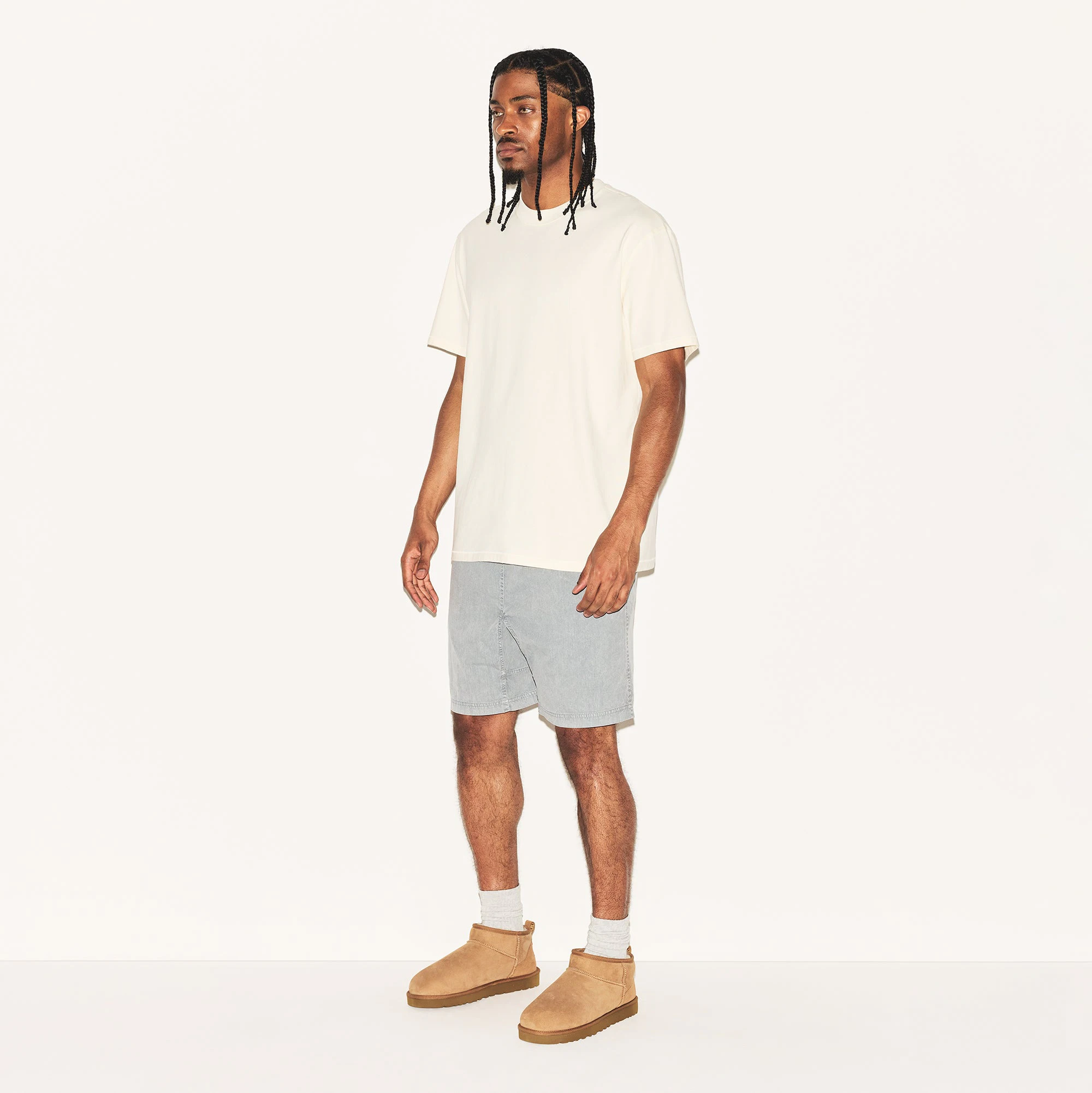 HEAVYWEIGHT COTTON MENS RELAXED T-SHIRT | ECRU ON A MODEL SIDE VIEW | FOCUS: 0.0, 1.0, 0.9