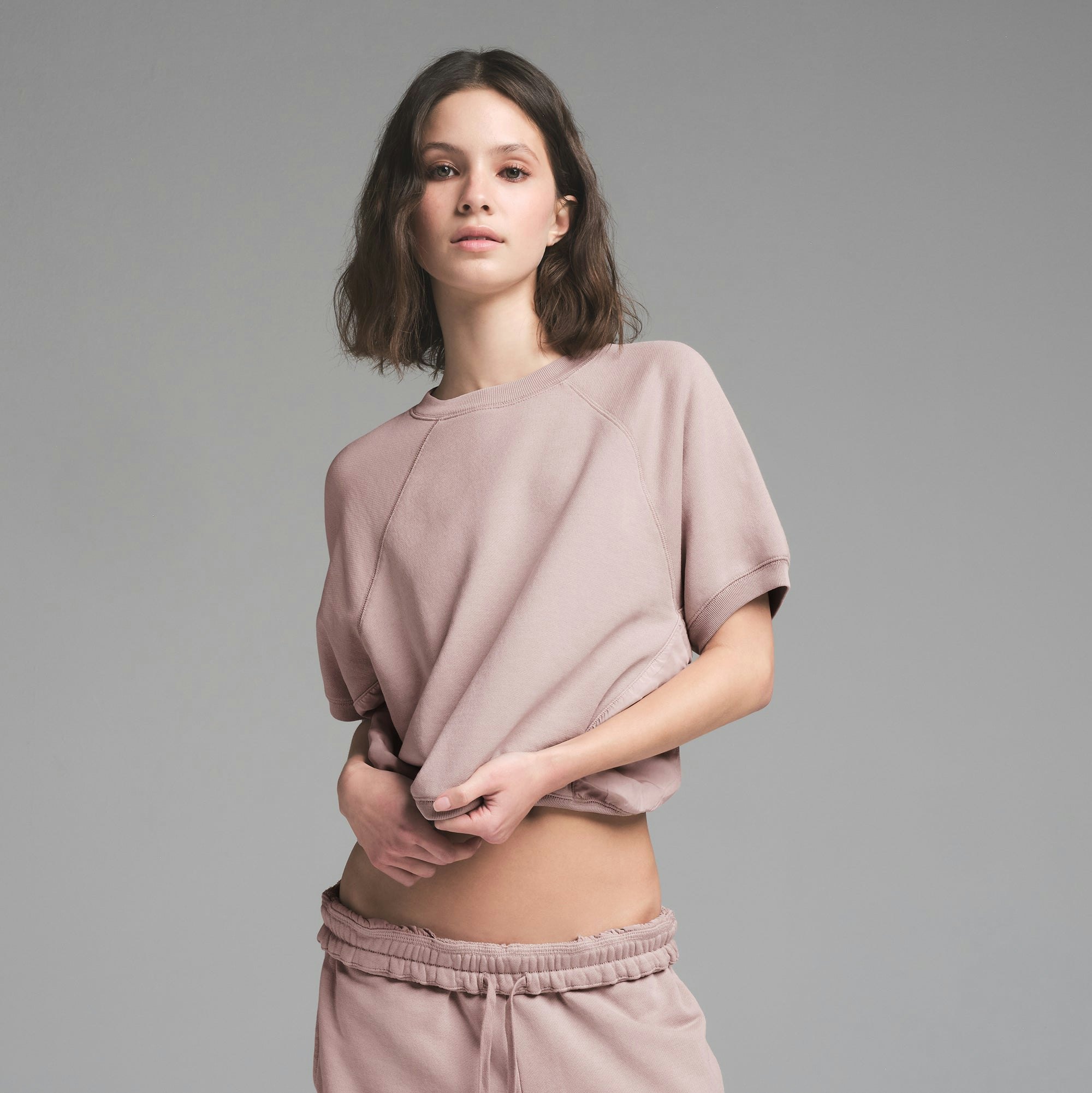 FRENCH TERRY RAGLAN SHORT SLEEVE SWEATSHIRT | FAWN ON A MODEL FRONT VIEW | FOCUS: 0.0, 1.0, 0.9