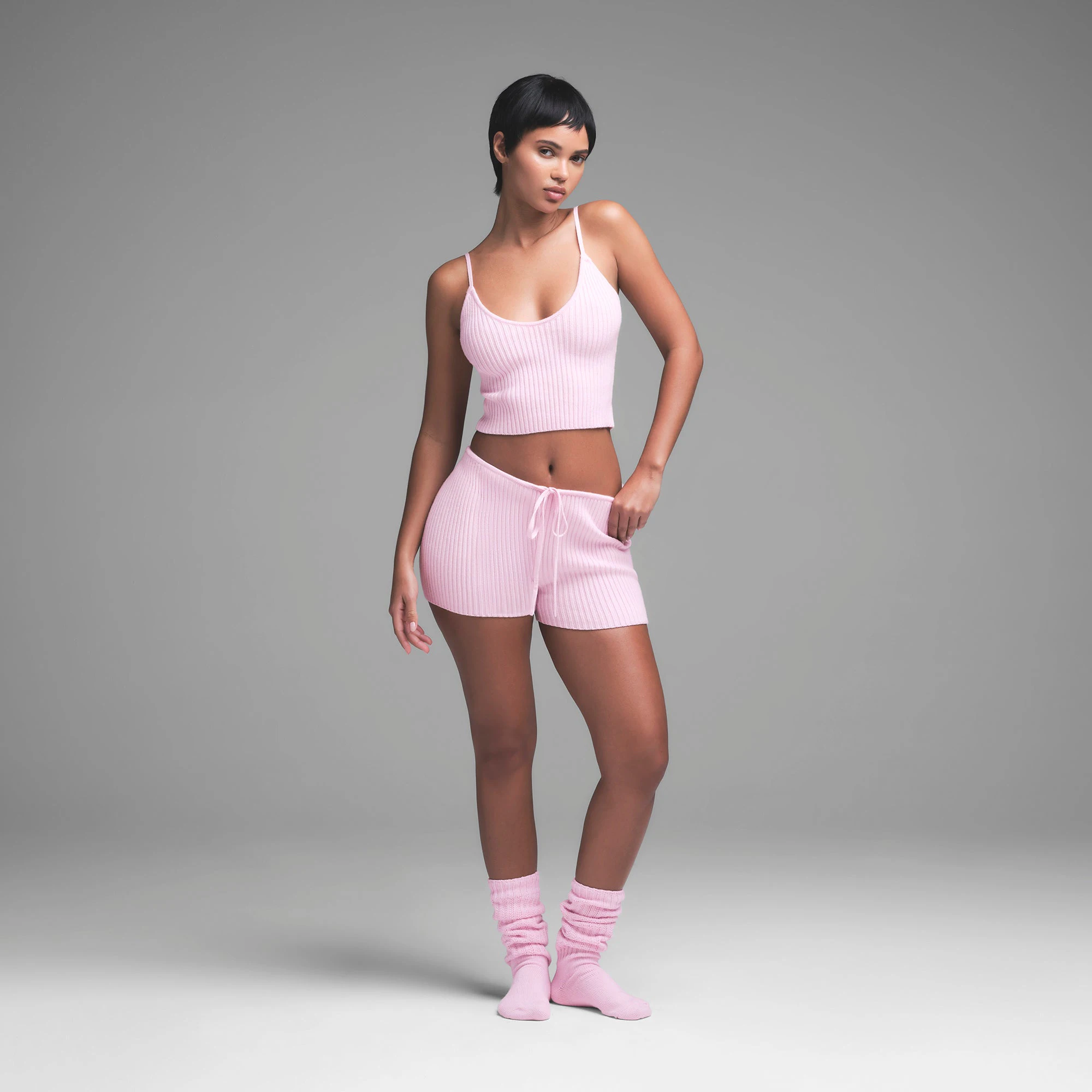 CABLE KNIT CAMI | BABY PINK ON A MODEL FRONT VIEW | FOCUS: 0.0, 1.0, 0.9