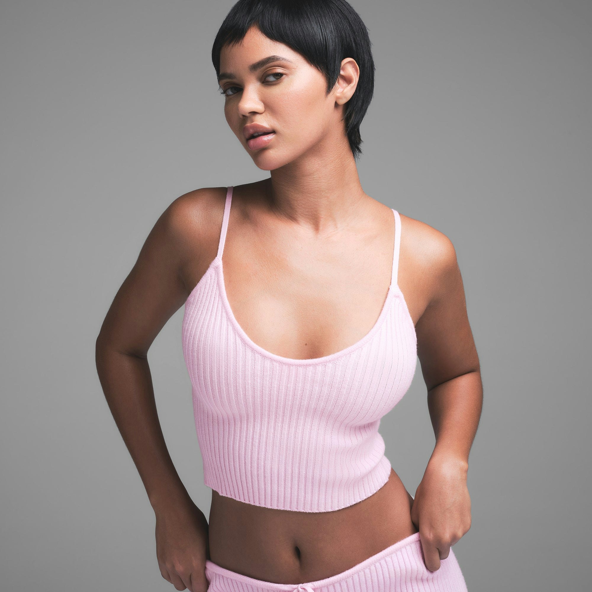 CABLE KNIT CAMI | BABY PINK ON A MODEL SIDE VIEW | FOCUS: 0.0, 1.0, 0.9