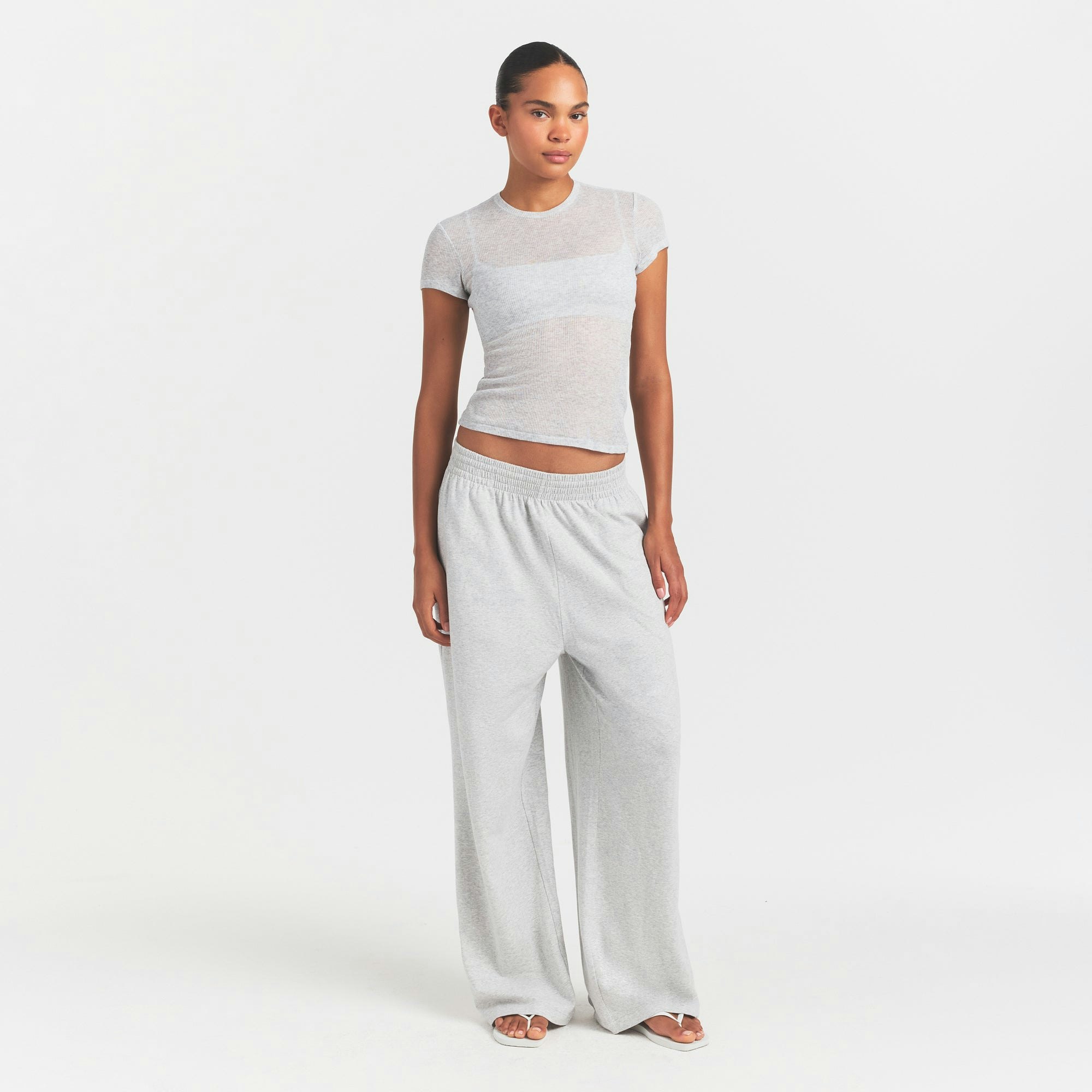 SHEER RIB T-SHIRT | LIGHT HEATHER GREY ON A MODEL FRONT VIEW @ | FOCUS: 0.0, 1.0, 0.9