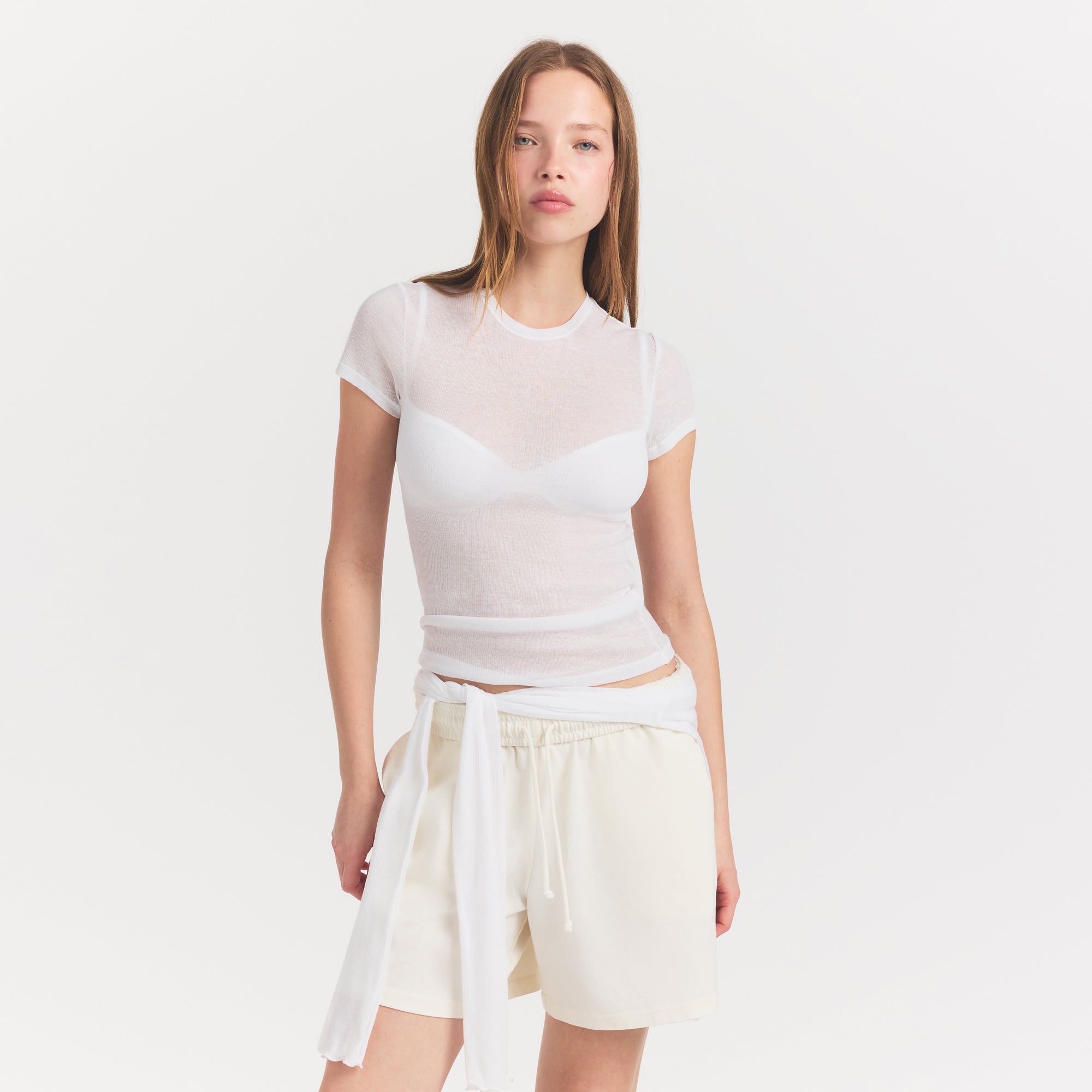 SHEER RIB T-SHIRT | SNOW ON A MODEL SIDE VIEW