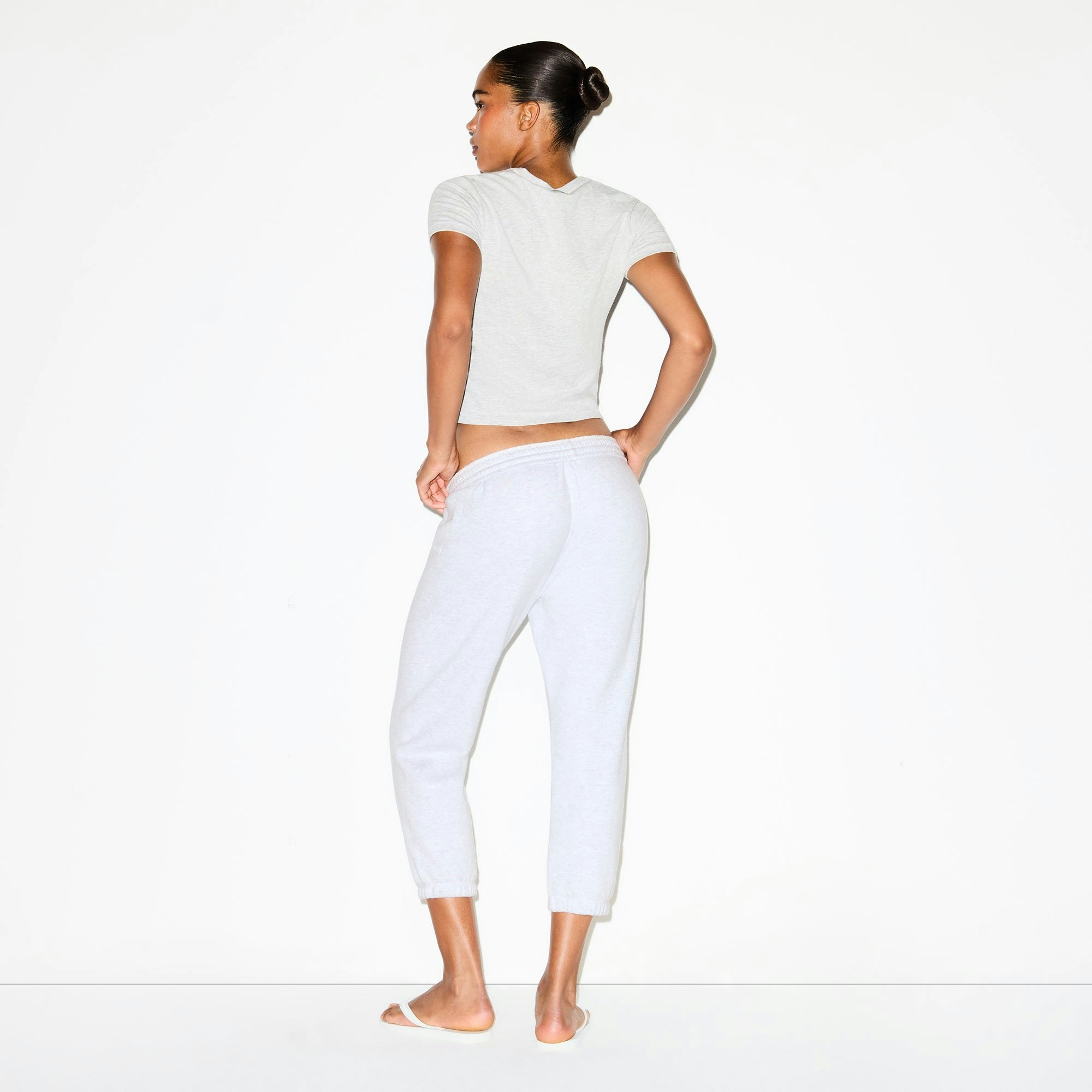 WORN IN JERSEY BABY V NECK TEE | LIGHT HEATHER GREY ON A MODEL FRONT VIEW @ | FOCUS: 0.0, 1.0, 0.9