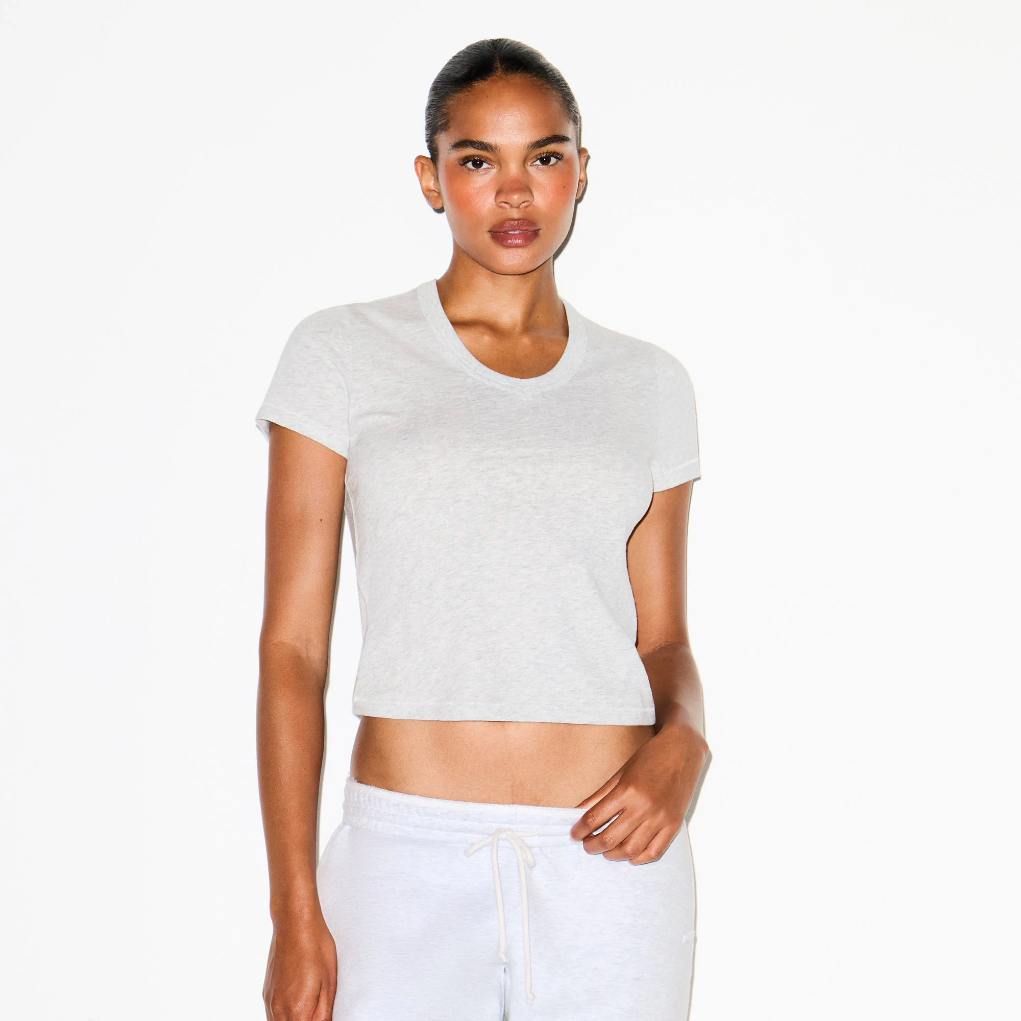 WORN IN JERSEY BABY V NECK TEE | LIGHT HEATHER GREY ON A MODEL SIDE VIEW @ | FOCUS: 0.0, 1.0, 0.9