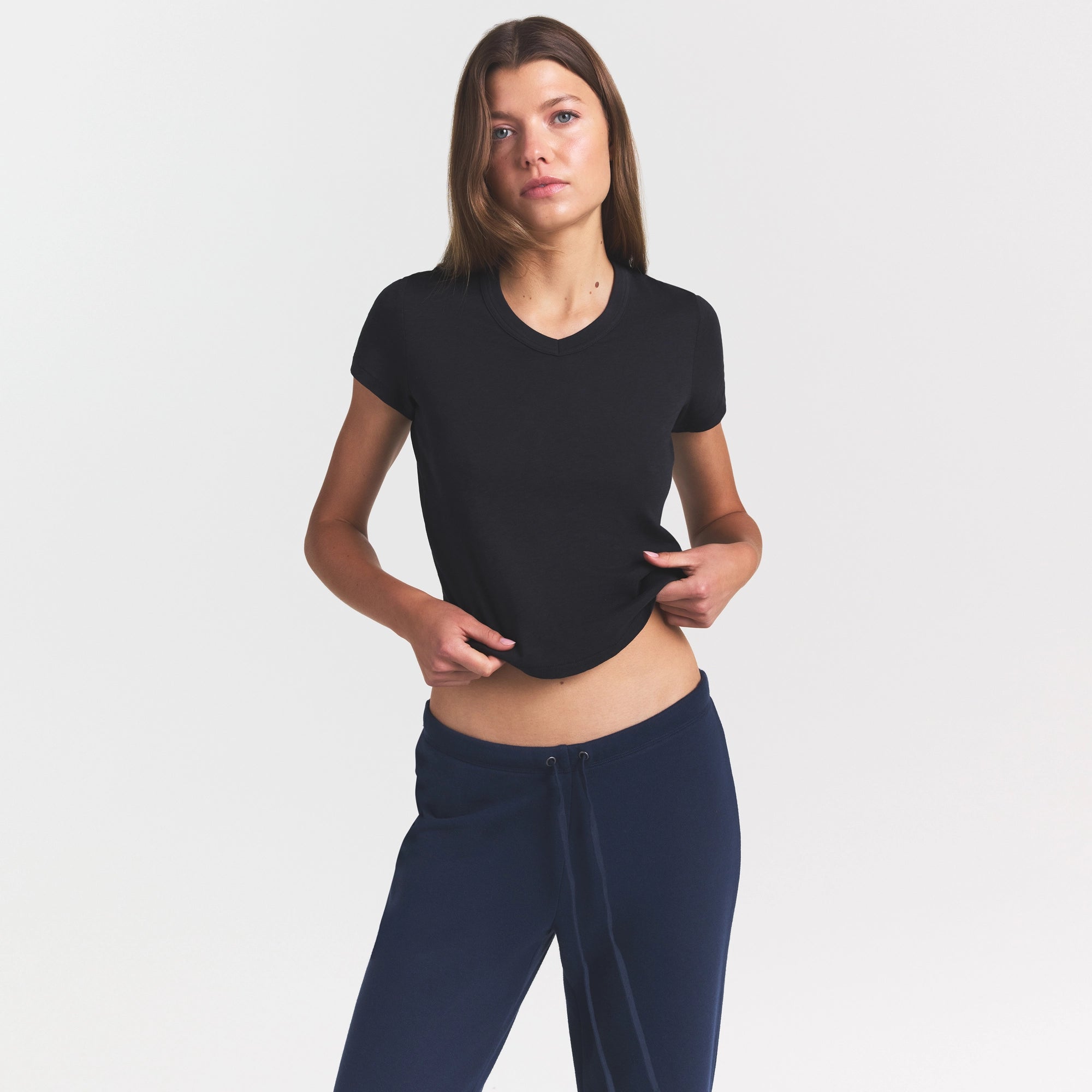 WORN IN JERSEY BABY V NECK TEE | WASHED ONYX ON A MODEL SIDE VIEW @ | FOCUS: 0.0, 1.0, 0.9