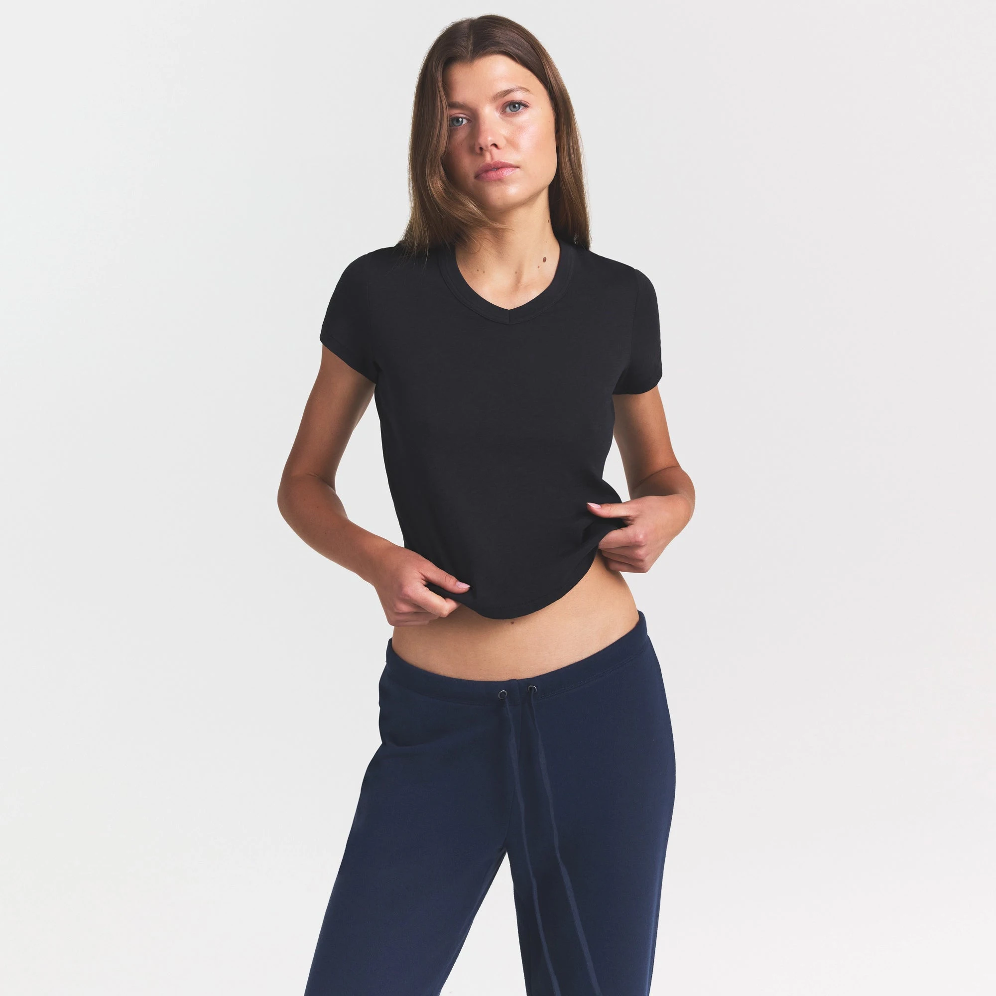 WORN IN JERSEY BABY V NECK TEE | WASHED ONYX ON A MODEL SIDE VIEW @ | FOCUS: 0.0, 1.0, 0.9