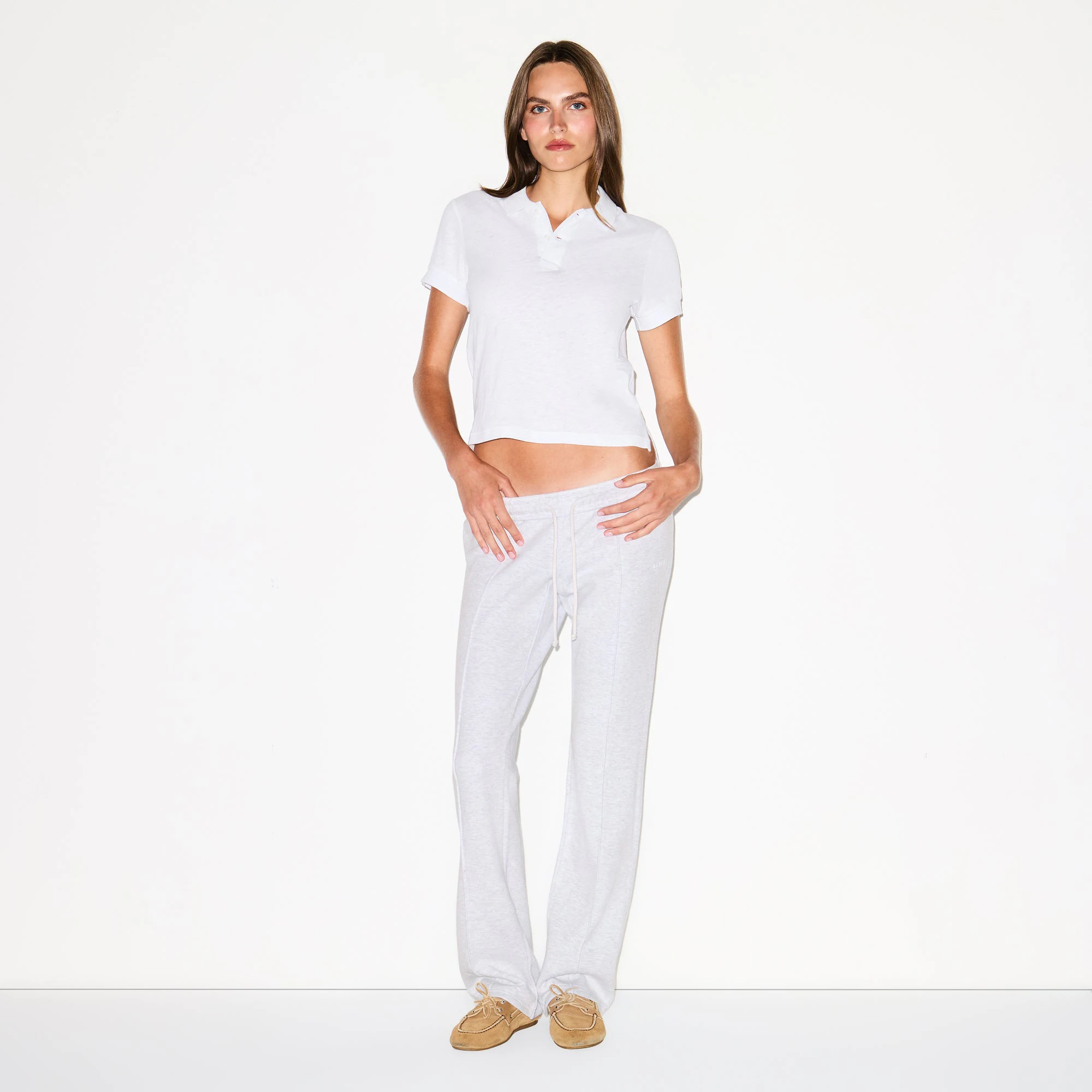 WORN IN JERSEY POLO | SNOW ON A MODEL FRONT VIEW @ | FOCUS: 0.0, 1.0, 0.9