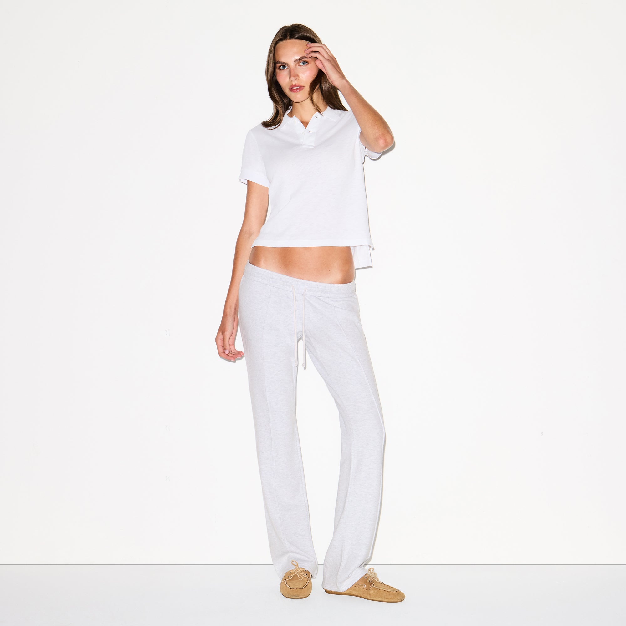 WORN IN JERSEY POLO | SNOW ON A MODEL FRONT VIEW @ | FOCUS: 0.0, 1.0, 0.9