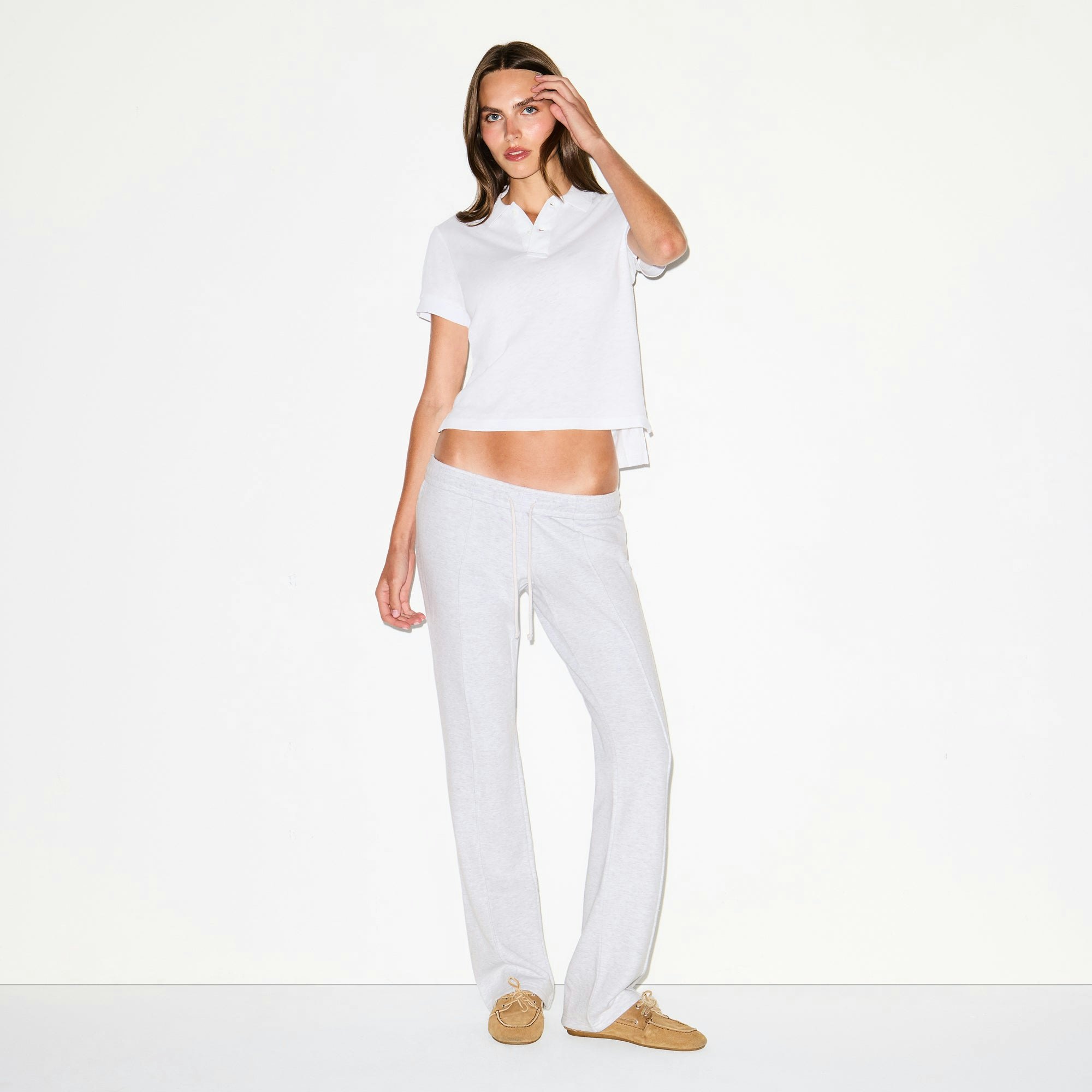 WORN IN JERSEY POLO | SNOW ON A MODEL FRONT VIEW @ | FOCUS: 0.0, 1.0, 0.9