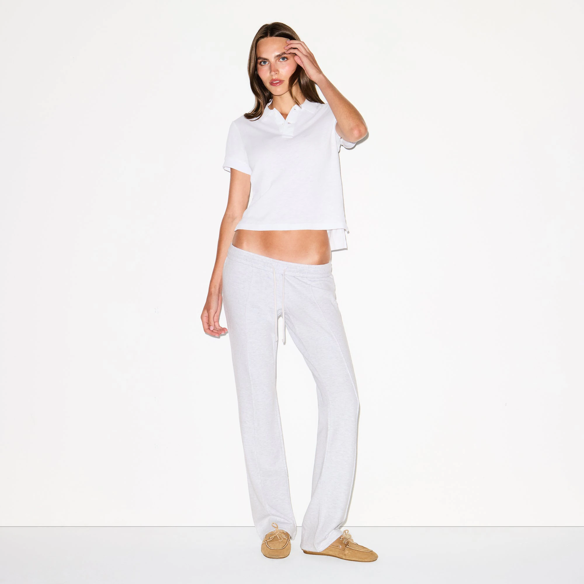 WORN IN JERSEY POLO | SNOW ON A MODEL FRONT VIEW @ | FOCUS: 0.0, 1.0, 0.9