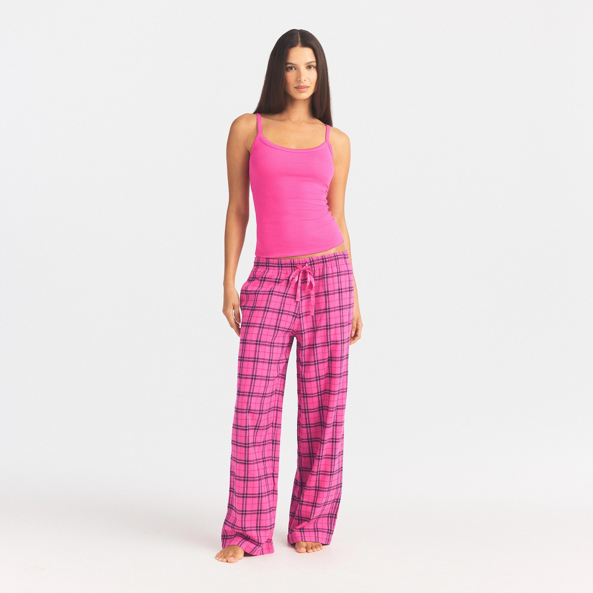 POINTELLE TANK AND FLANNEL PANT SLEEP SET | HOT PINK HOLLY PLAID ON A MODEL FRONT VIEW @ | FOCUS: 0.0, 1.0, 0.9