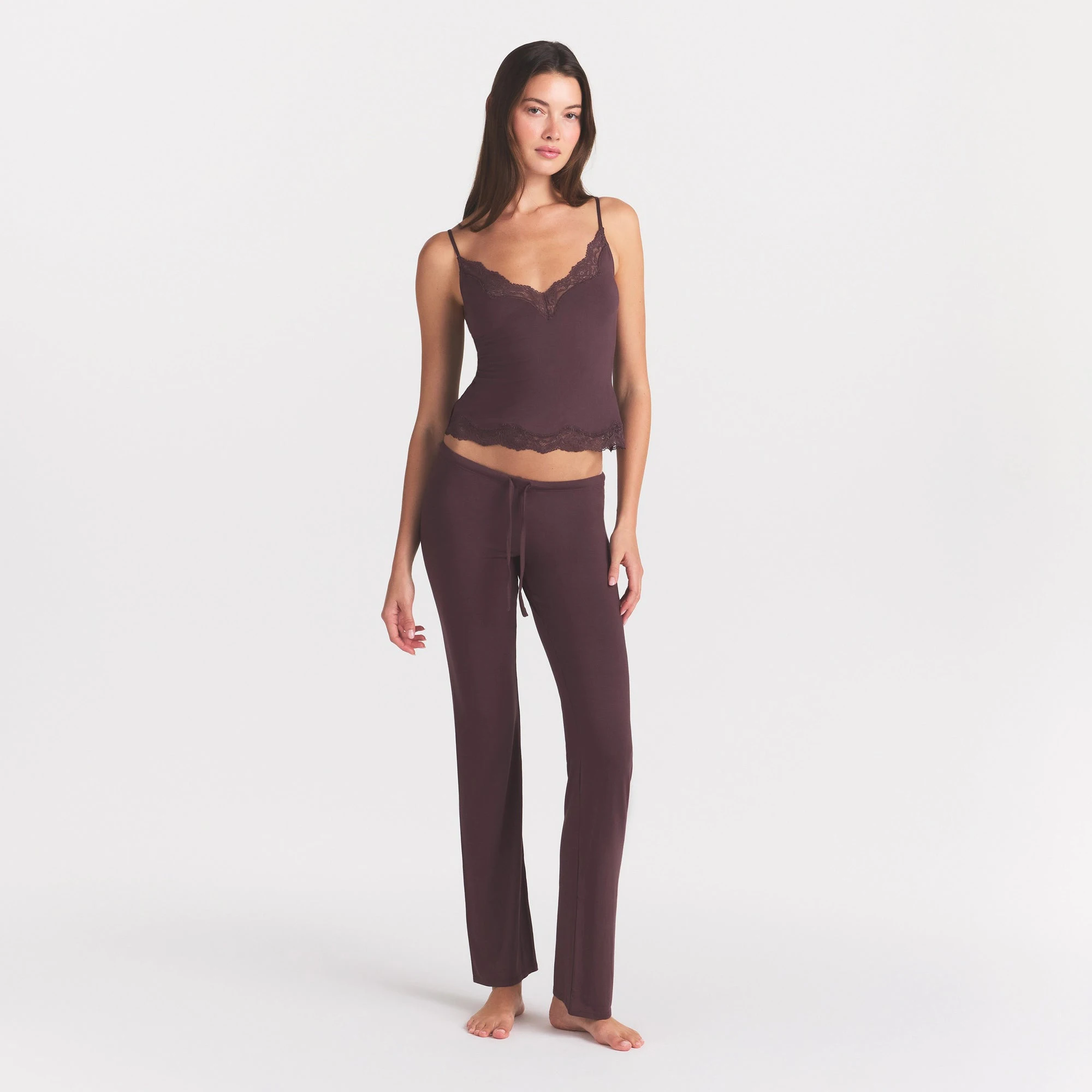 SKIMS SLEEP LACE CAMI AND PANT SET | RAISIN ON A MODEL FRONT VIEW @ | FOCUS: 0.0, 1.0, 0.9