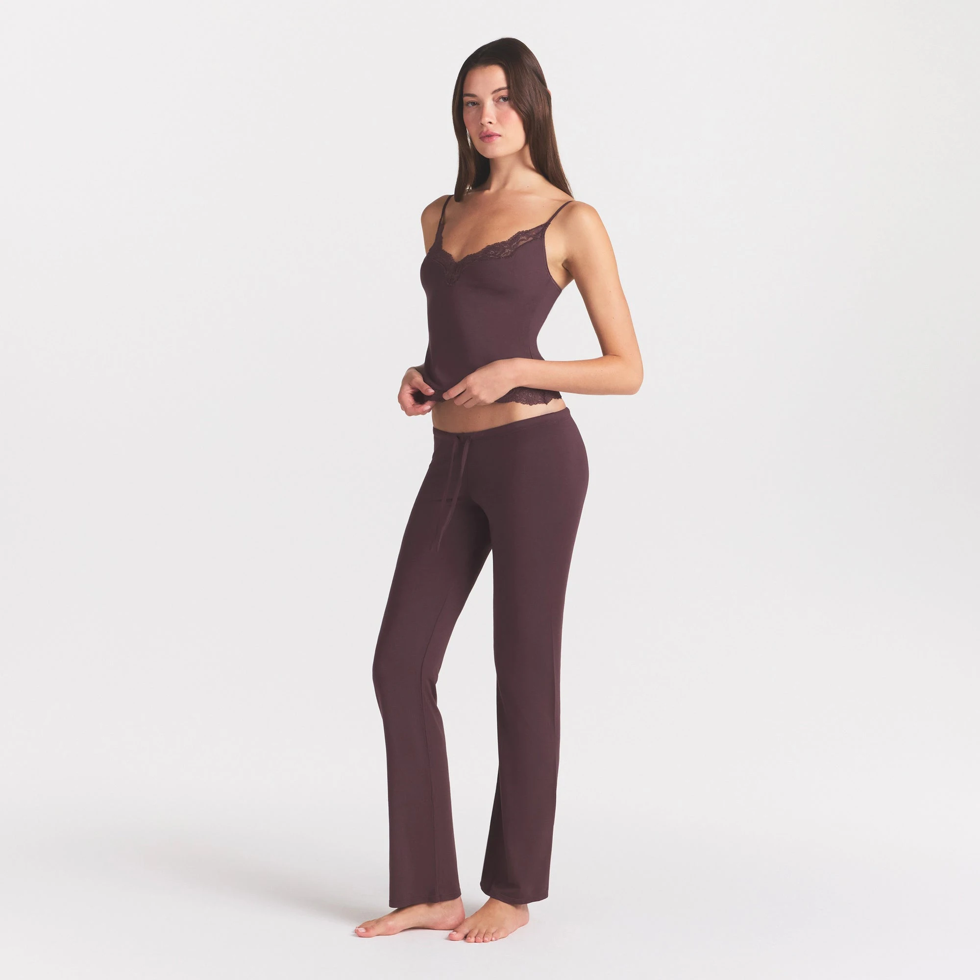 SKIMS SLEEP LACE CAMI AND PANT SET | RAISIN ON A MODEL FRONT VIEW @ | FOCUS: 0.0, 1.0, 0.9