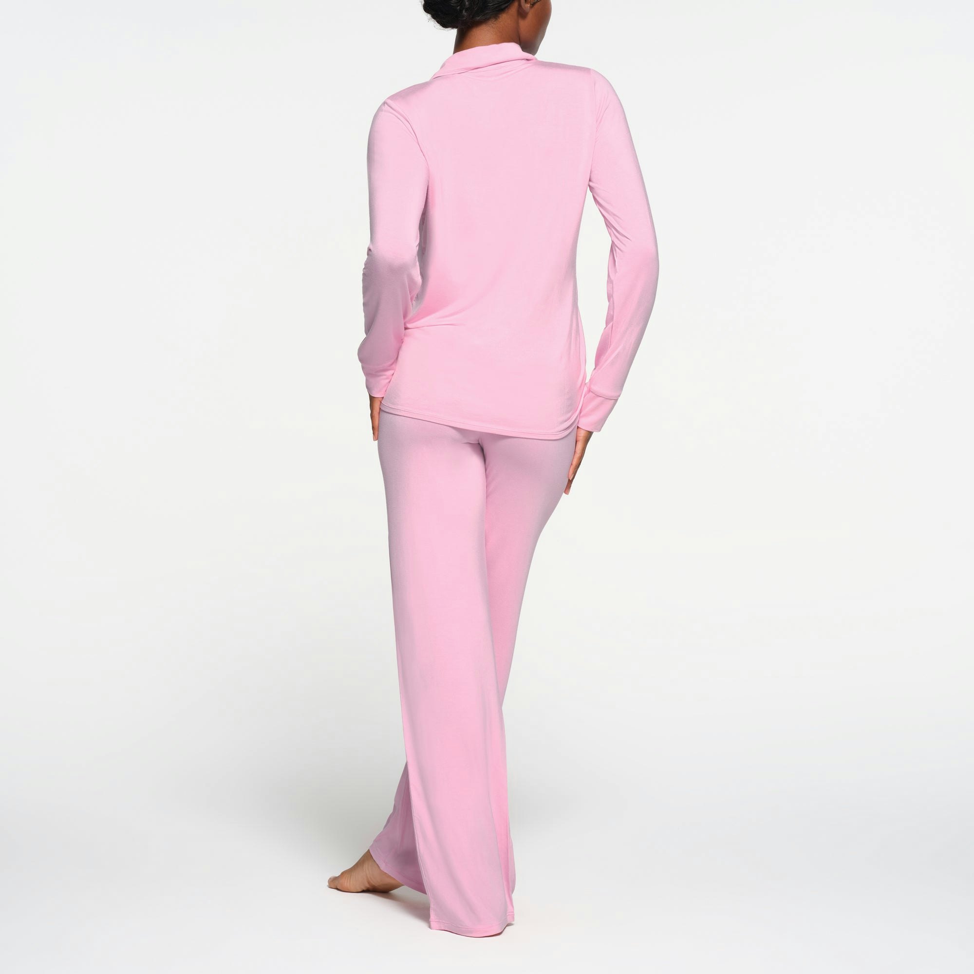 SKIMS SLEEP LONG SLEEVE BUTTON UP SET | BUBBLE GUM ON A MODEL BACK VIEW
