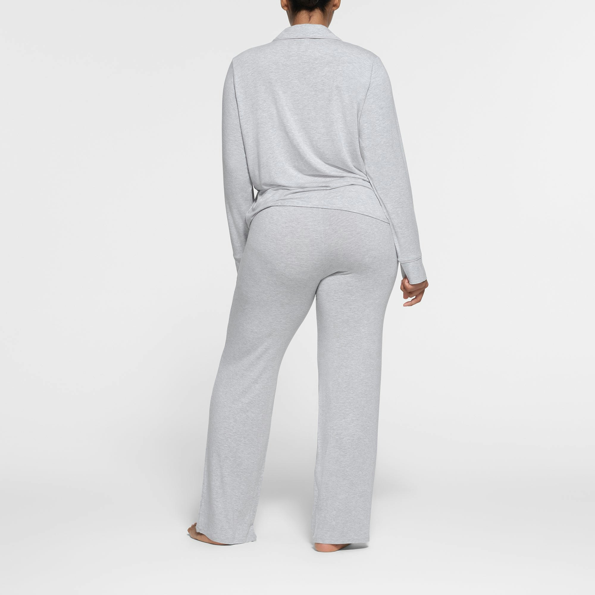 SKIMS SLEEP LONG SLEEVE BUTTON UP SET | LIGHT HEATHER GREY ON A MODEL BACK VIEW