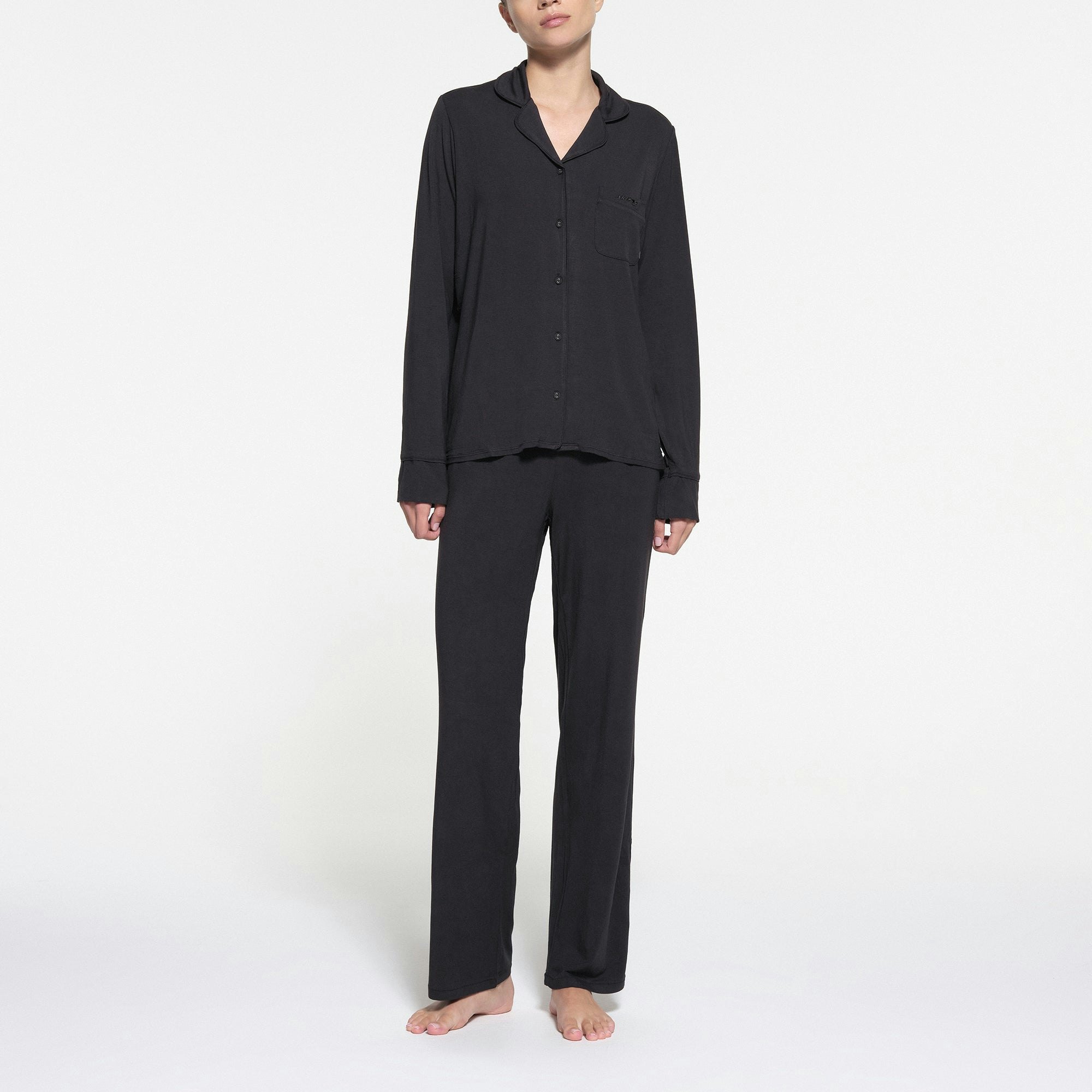 SKIMS SLEEP LONG SLEEVE BUTTON UP SLEEP SET | ONYX ON A MODEL FRONT VIEW