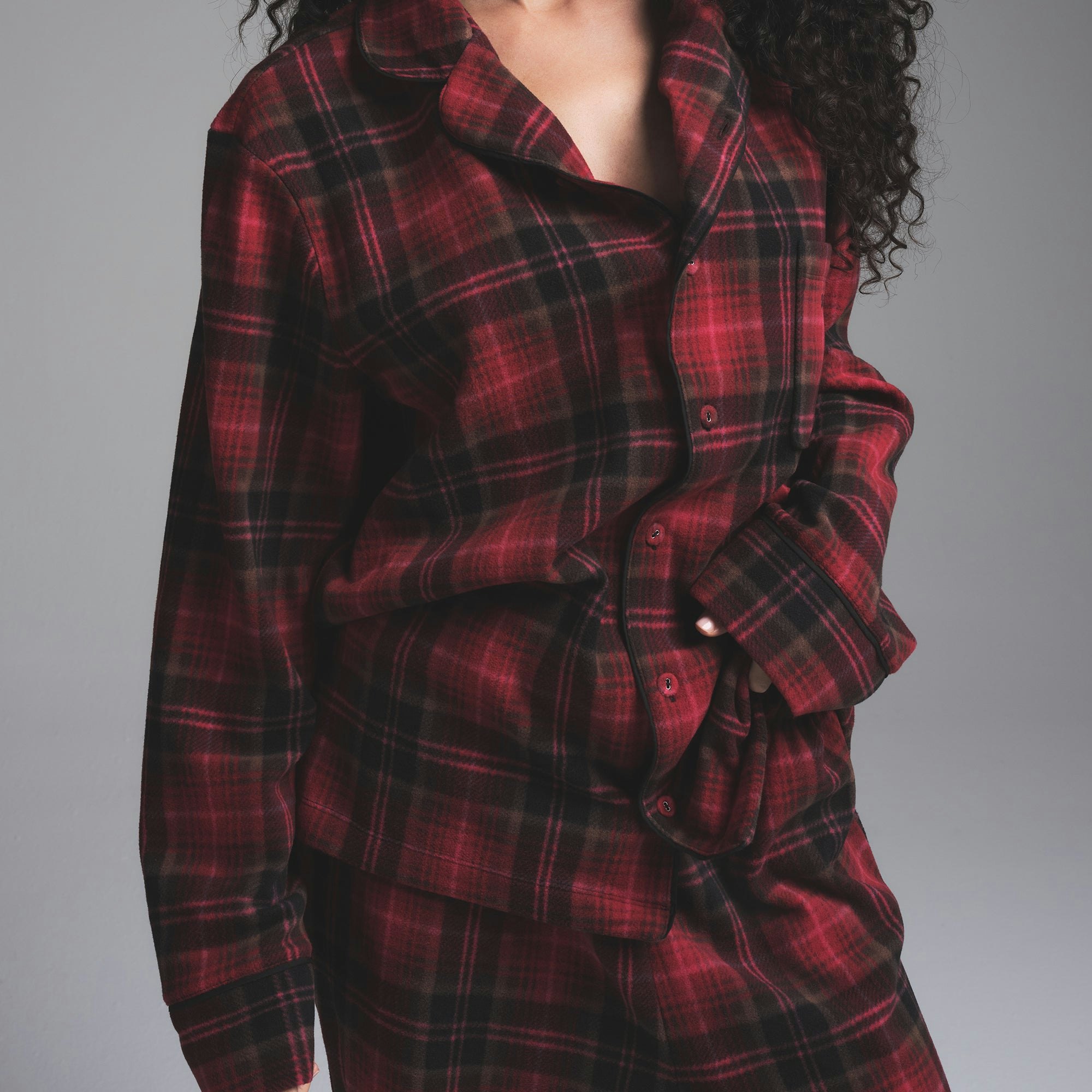 FLEECE SLEEP UNISEX SLEEP SET | CRANBERRY PLAID ON A MODEL SIDE VIEW | FOCUS: 0.0, 1.0, 0.9