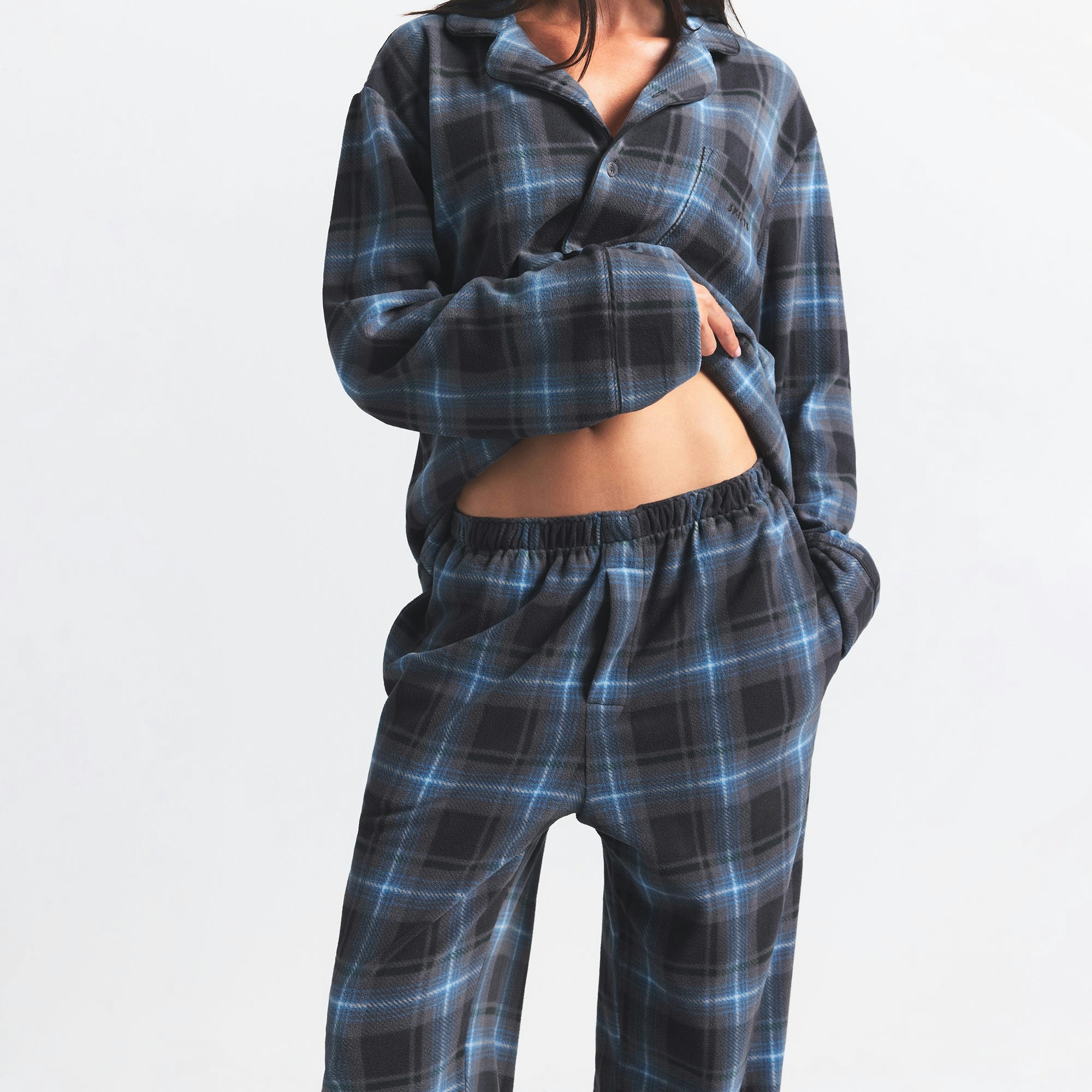FLEECE SLEEP UNISEX SLEEP SET | GLACIER PLAID ON A MODEL FRONT VIEW @ | FOCUS: 0.0, 1.0, 0.9