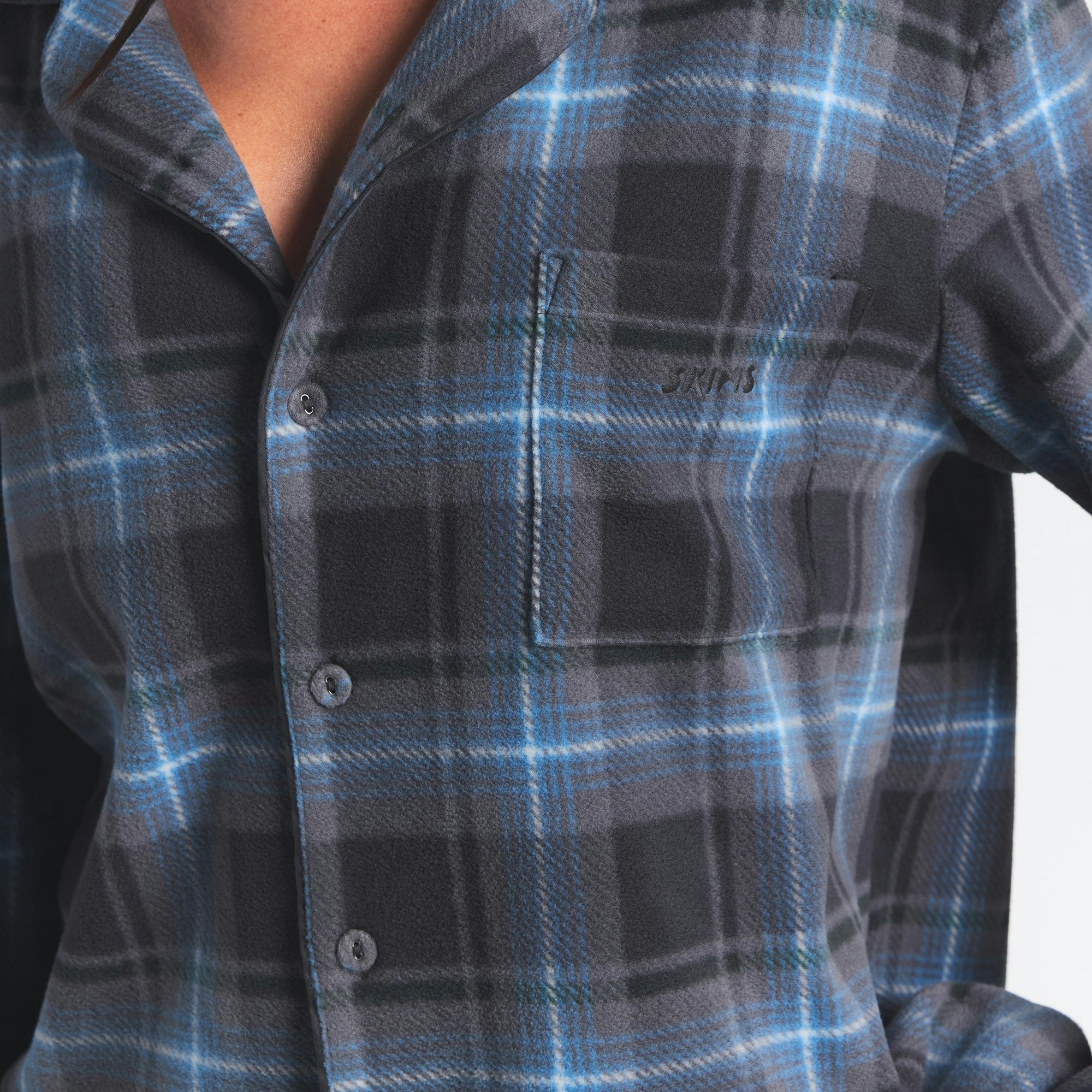 FLEECE SLEEP UNISEX SLEEP SET | GLACIER PLAID ON A MODEL FRONT VIEW @ | FOCUS: 0.0, 1.0, 0.9