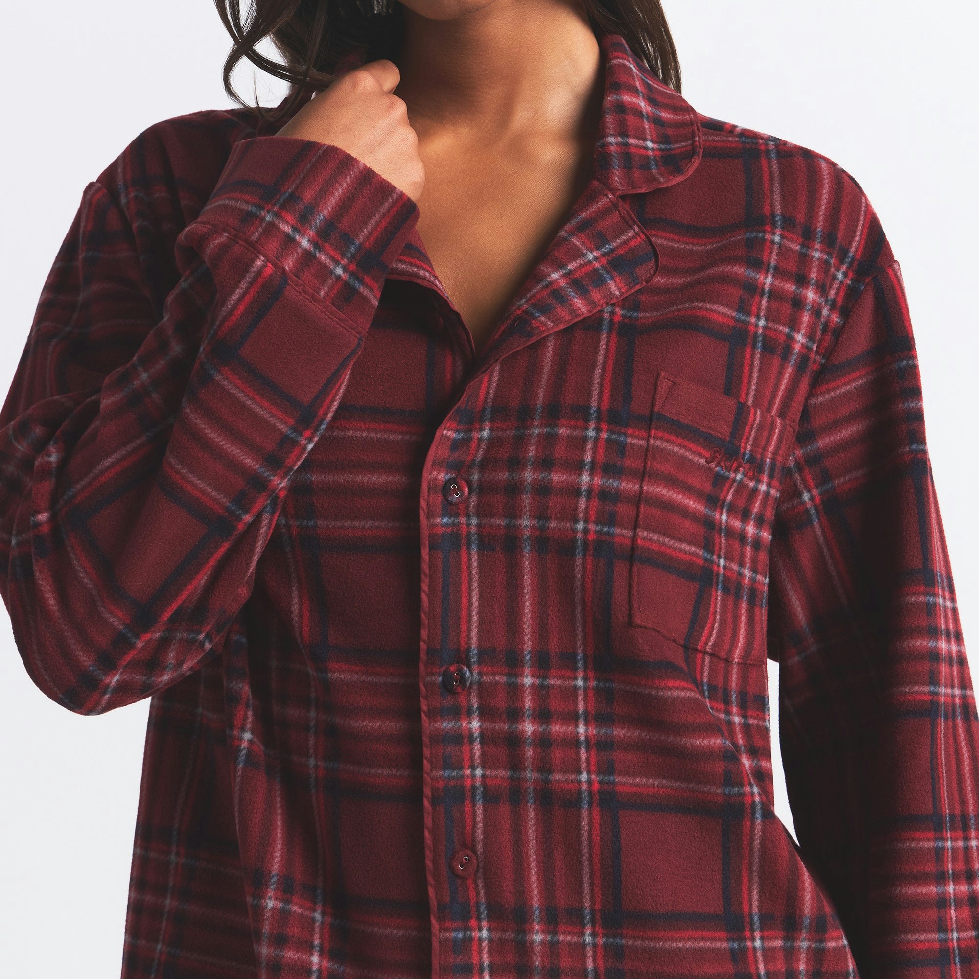 FLEECE SLEEP UNISEX SLEEP SET | MERLOT RED PLAID ON A MODEL FRONT VIEW @ | FOCUS: 0.0, 1.0, 0.9