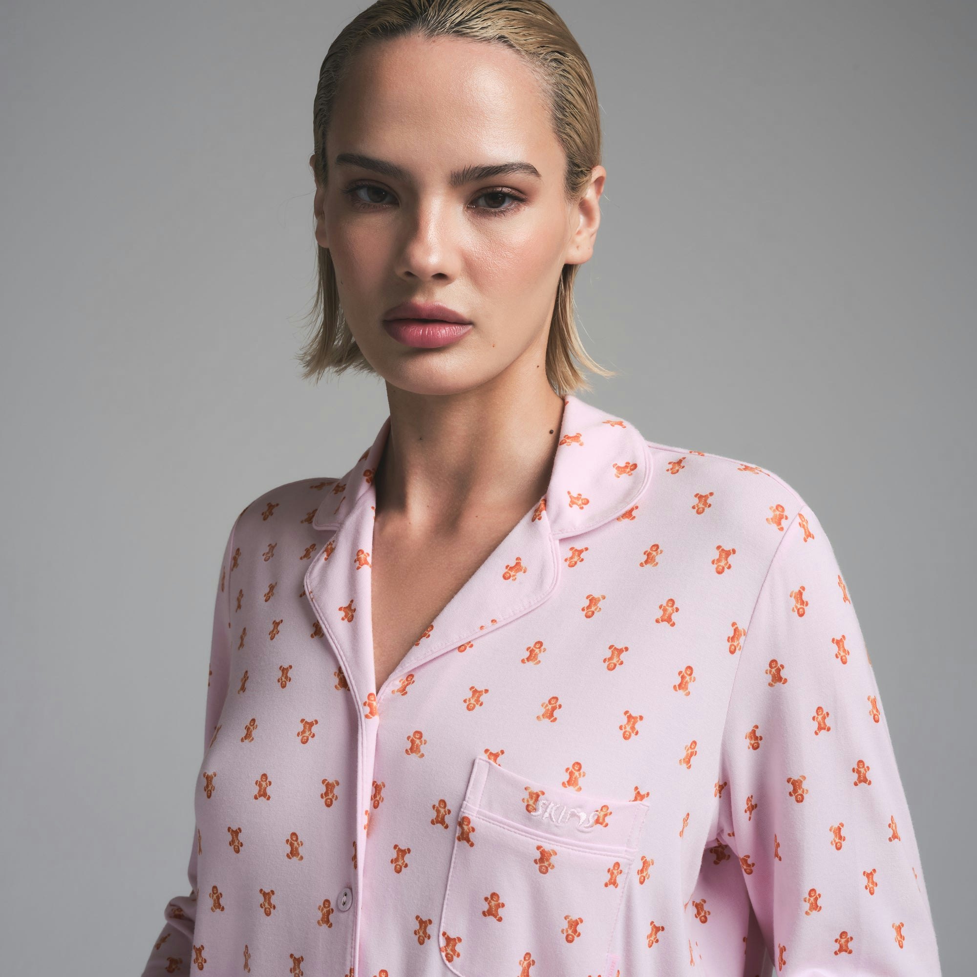 SKIMS SLEEP LONG SLEEVE BUTTON UP SET | CHERRY BLOSSOM GINGERBREAD PRINT ON A MODEL SIDE VIEW