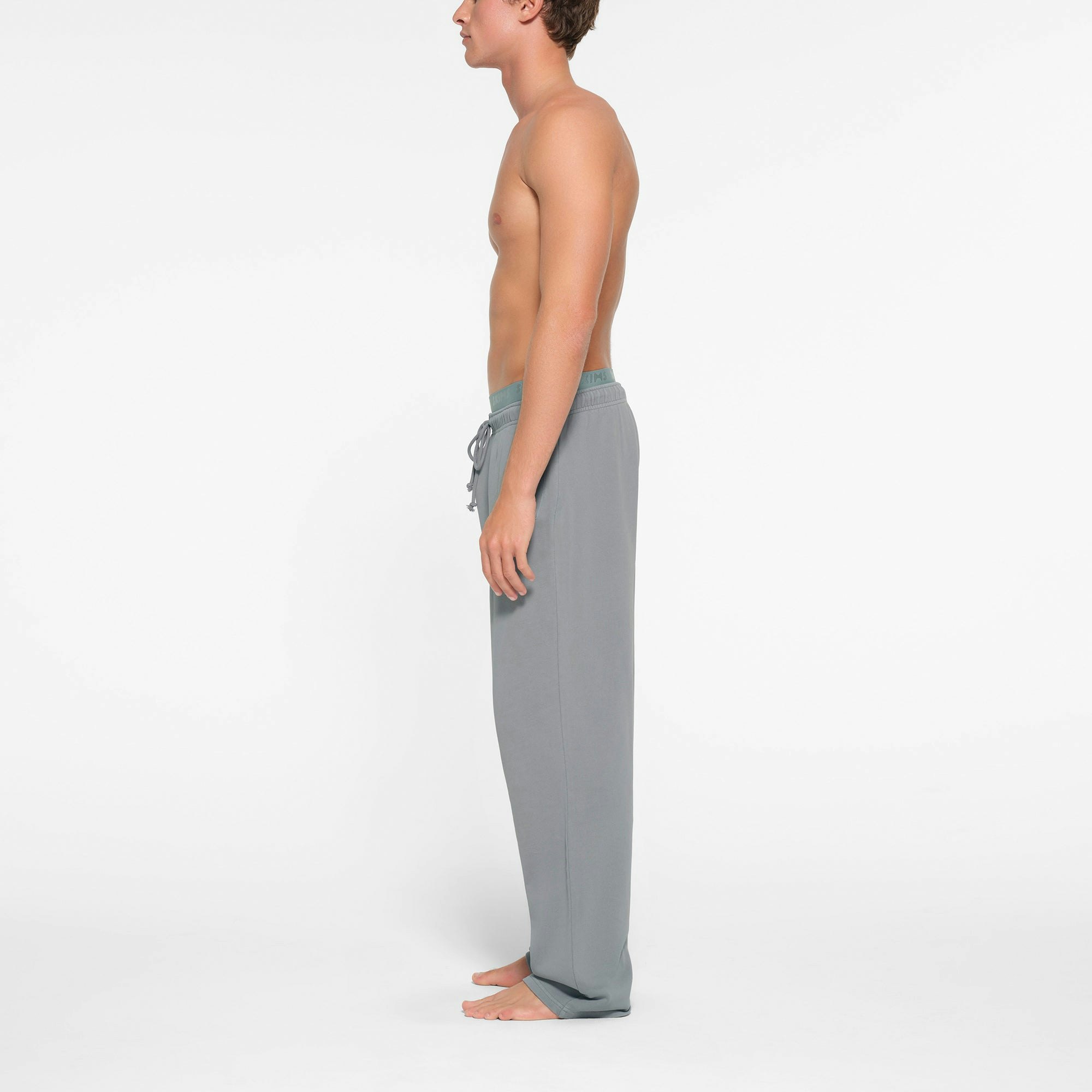 TERRY MENS STRAIGHT LEG PANT | PACIFIC ON A MODEL SIDE VIEW