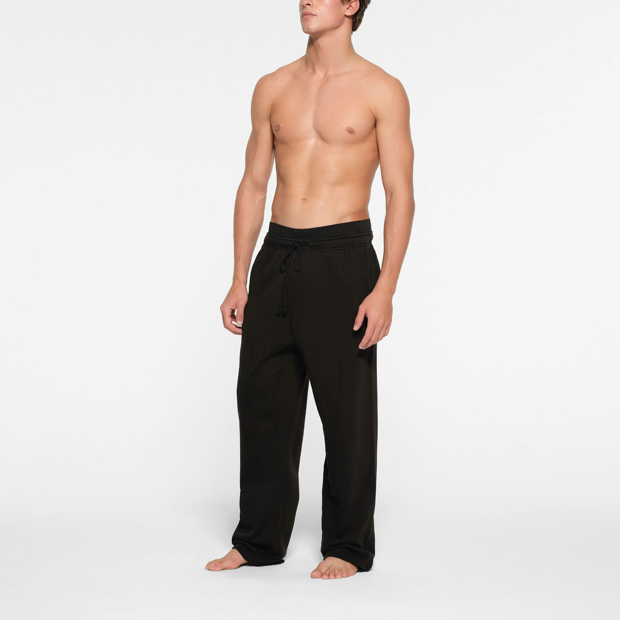 TERRY MENS STRAIGHT LEG PANT | WASHED OBSIDIAN ON A MODEL FRONT VIEW