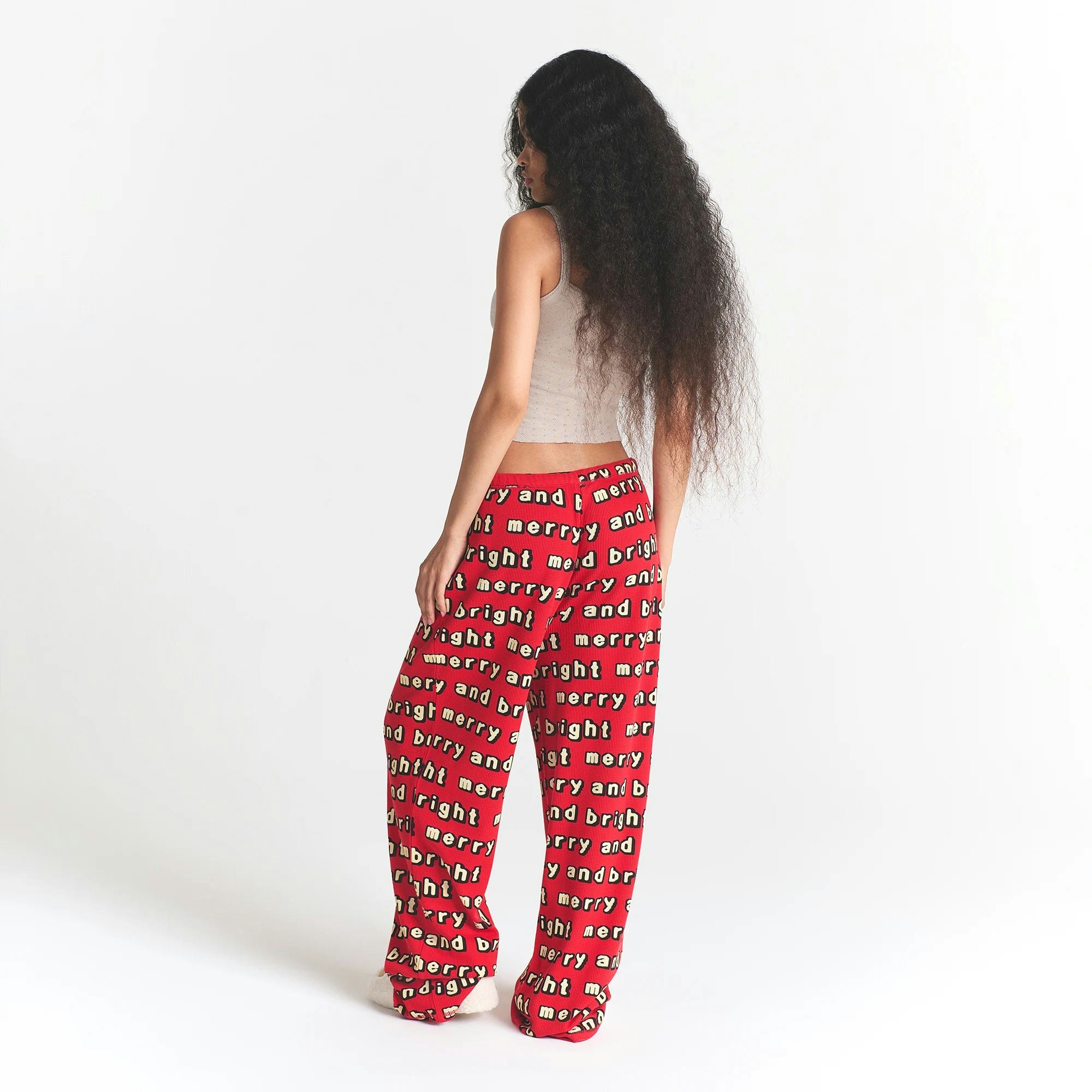 CACTUS PLANT FLEA MARKET X SKIMS HEAVY POINTELLE AND WAFFLE SLEEP SET| STONE JINGLE BELLS PRINT ON A MODEL BACK VIEW @ | FOCUS: 0.0, 1.0, 0.9