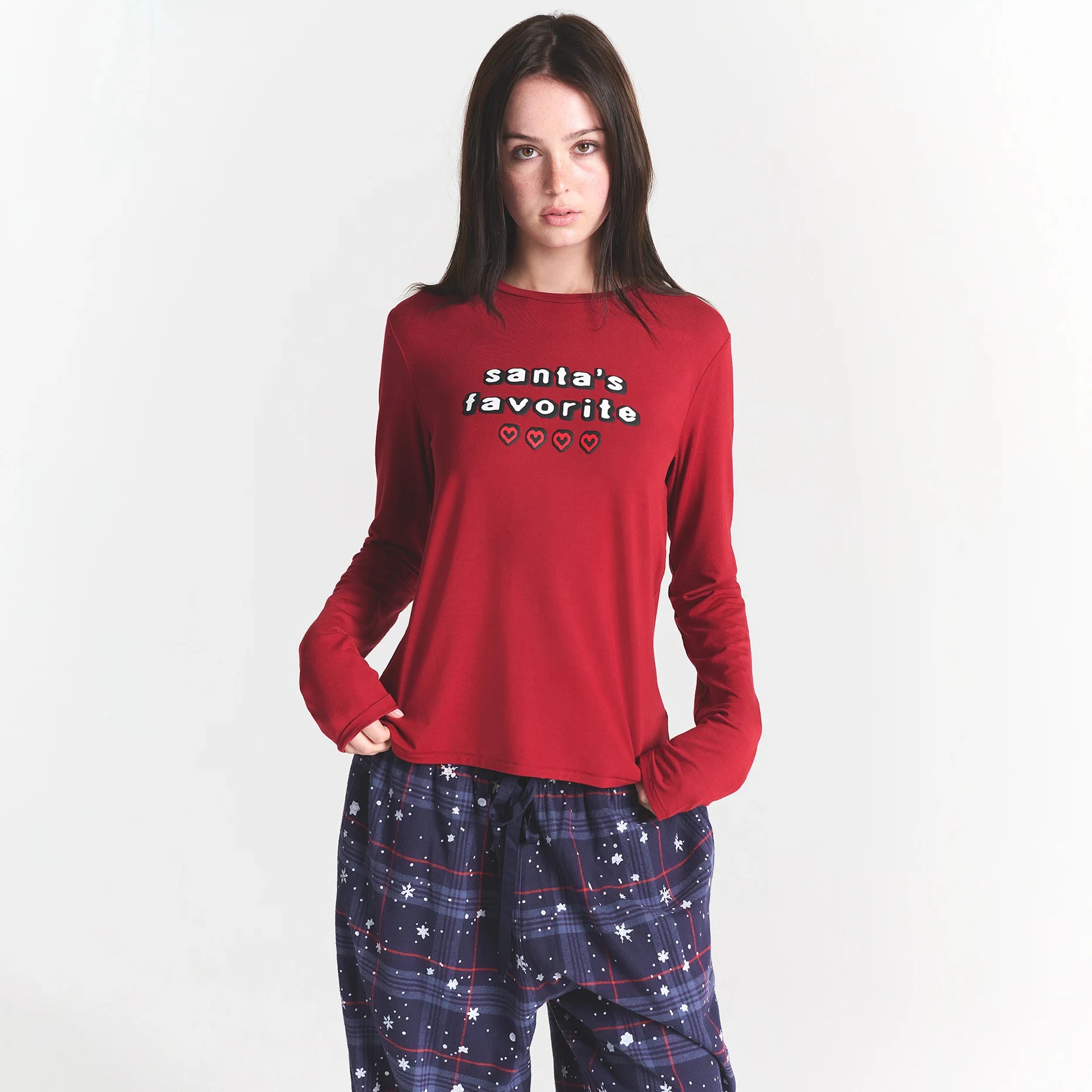 CACTUS PLANT FLEA MARKET X SKIMS SKIMS SLEEP FLANNEL PANT SET | SANTAS FAVORITE BRICK PRINT ON A MODEL FRONT VIEW @ | FOCUS: 0.0, 1.0, 0.9