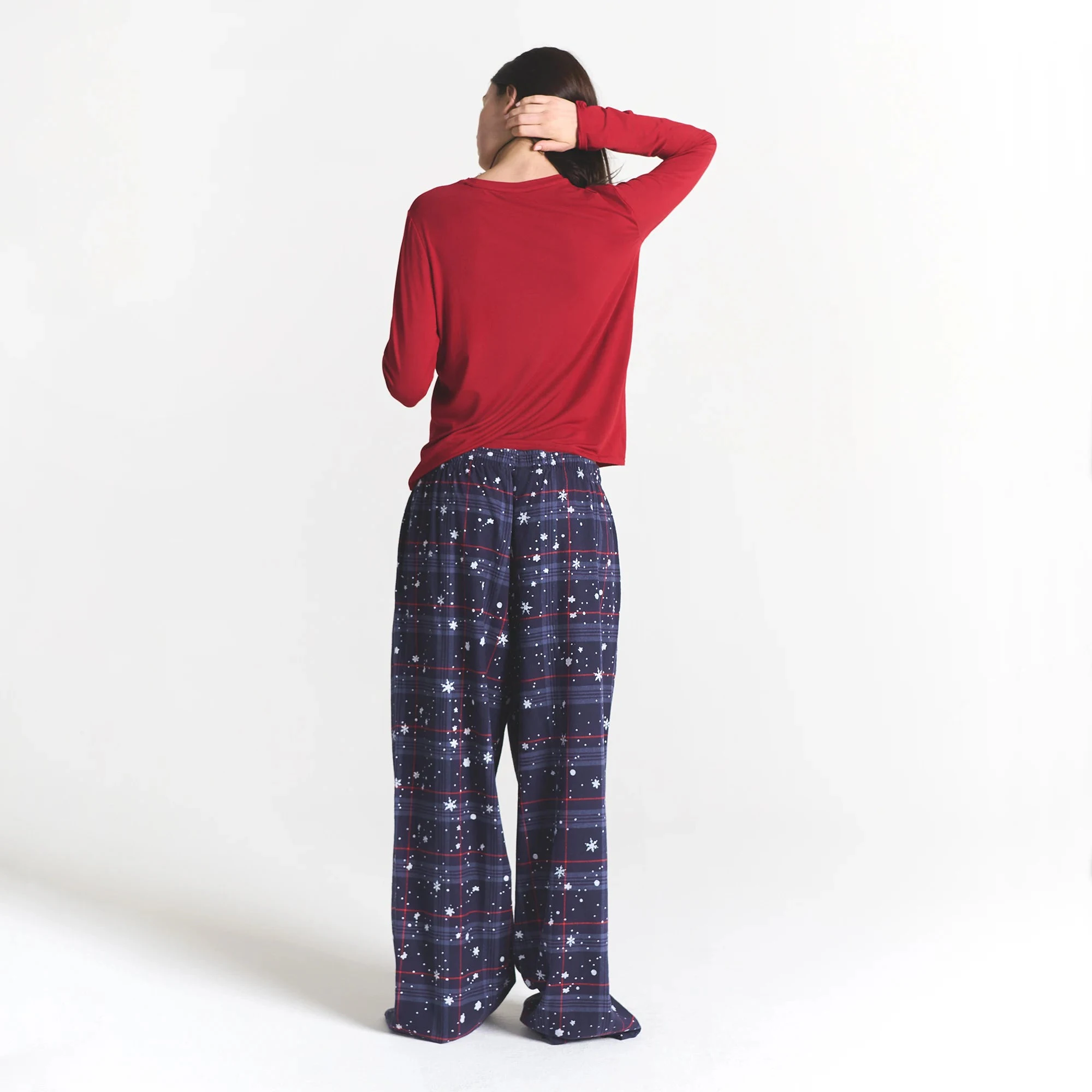 CACTUS PLANT FLEA MARKET X SKIMS SKIMS SLEEP FLANNEL PANT SET | SANTAS FAVORITE BRICK PRINT ON A MODEL BACK VIEW @ | FOCUS: 0.0, 1.0, 0.9