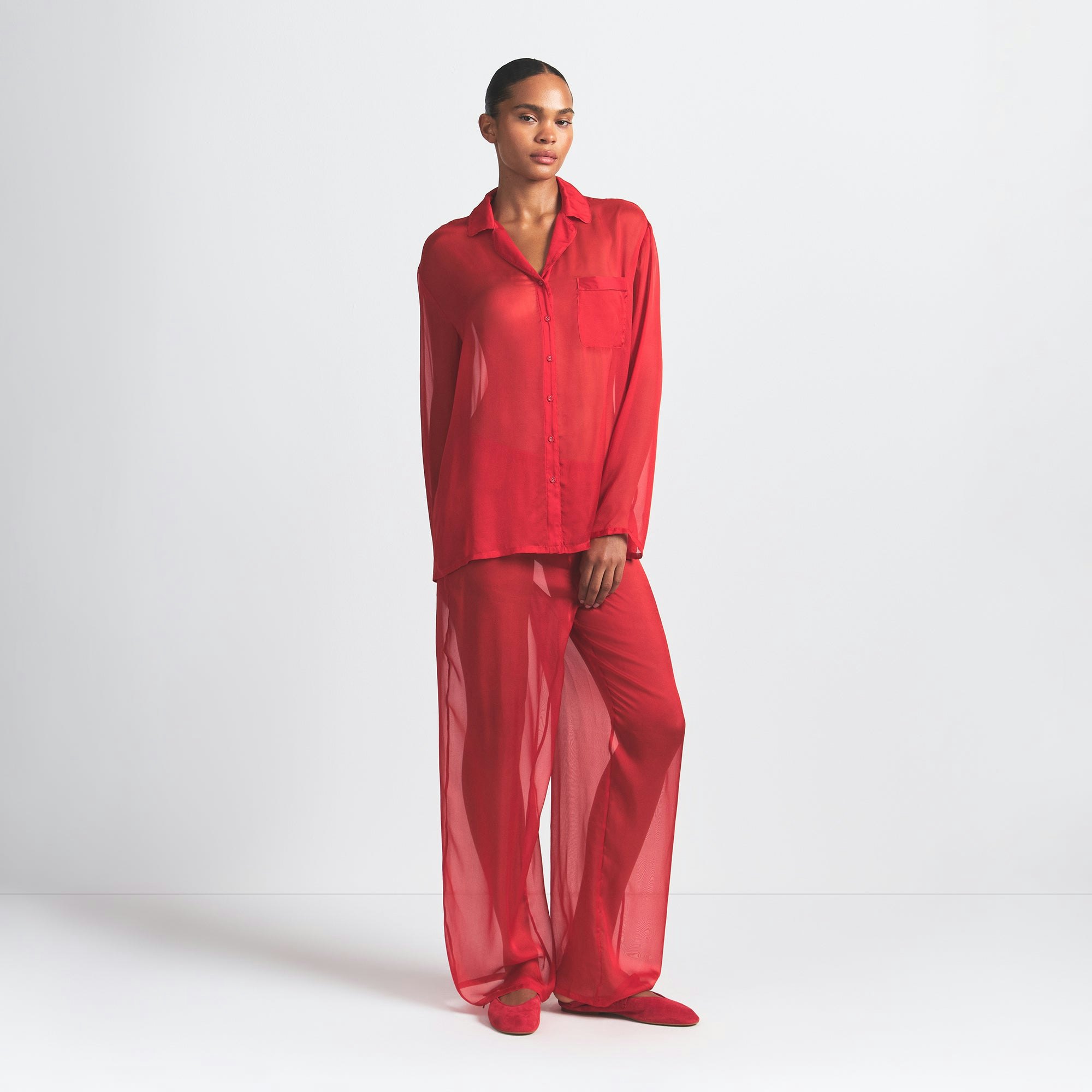 SKIMS ROMANCE BUTTON UP SHIRT AND PANT SET | CRANBERRY ON A MODEL FRONT VIEW @ | FOCUS: 0.0, 1.0, 0.9