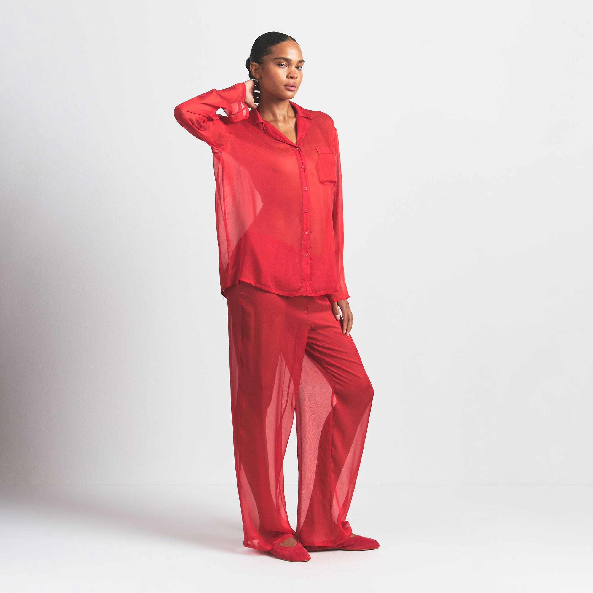 SKIMS ROMANCE BUTTON UP SHIRT AND PANT SET | CRANBERRY ON A MODEL SIDE VIEW @ | FOCUS: 0.0, 1.0, 0.9
