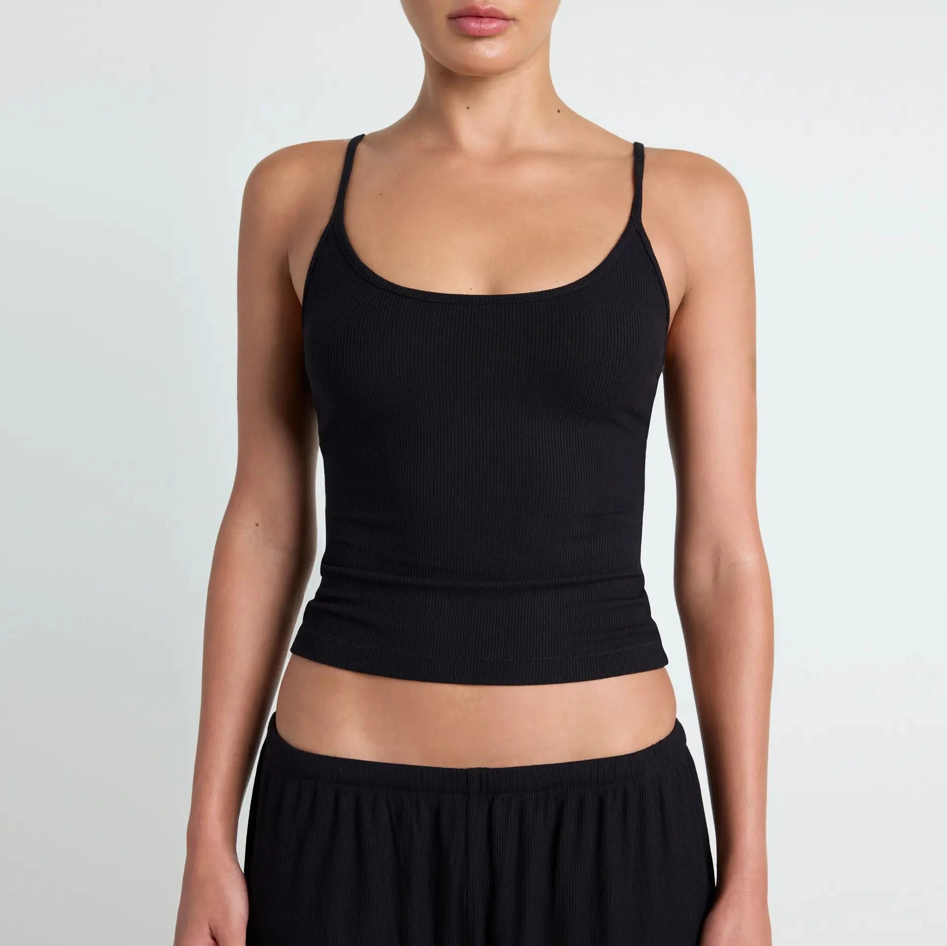 SOFT LOUNGE TANK SLEEP SET | ONYX ON A MODEL SIDE VIEW @ | FOCUS: 0.0, 1.0, 0.9