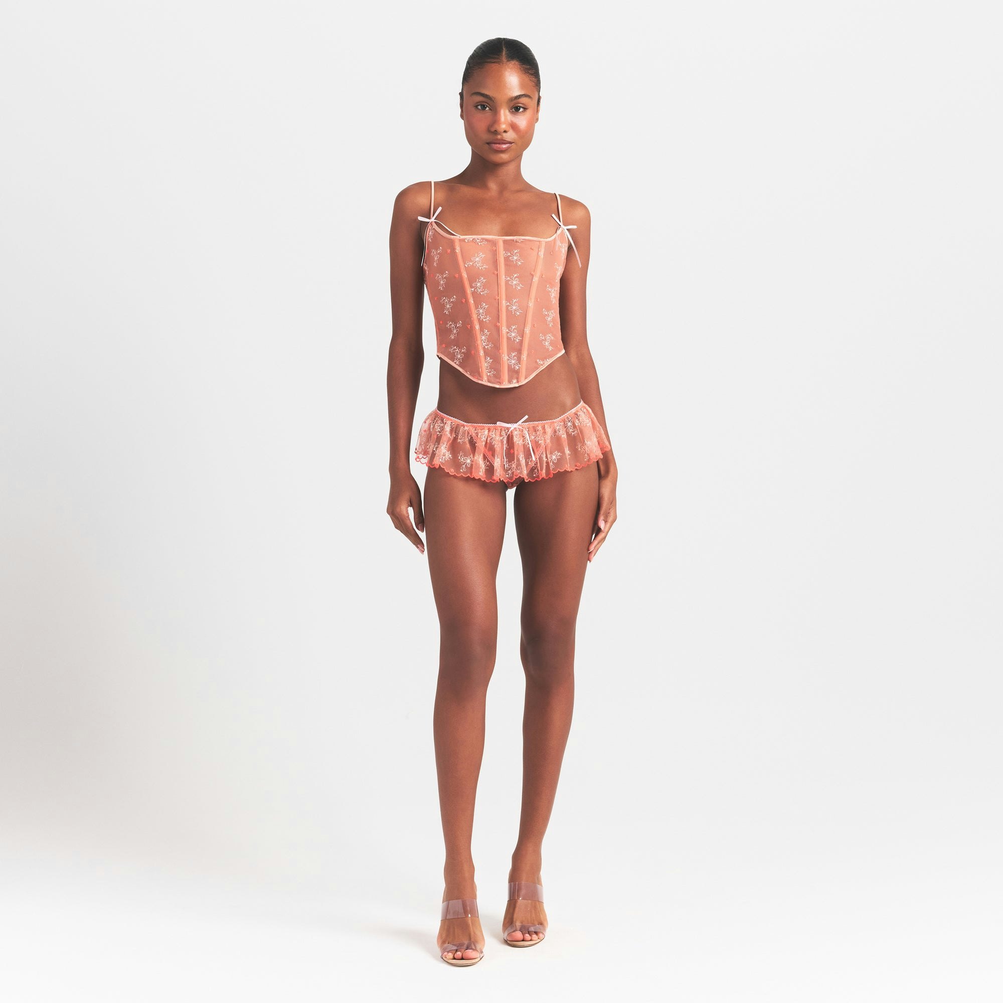 EMBROIDERED TULLE CORSET | GUAVA HEART TULLE ON A MODEL FRONT VIEW @ | FOCUS: 0.0, 1.0, 0.9