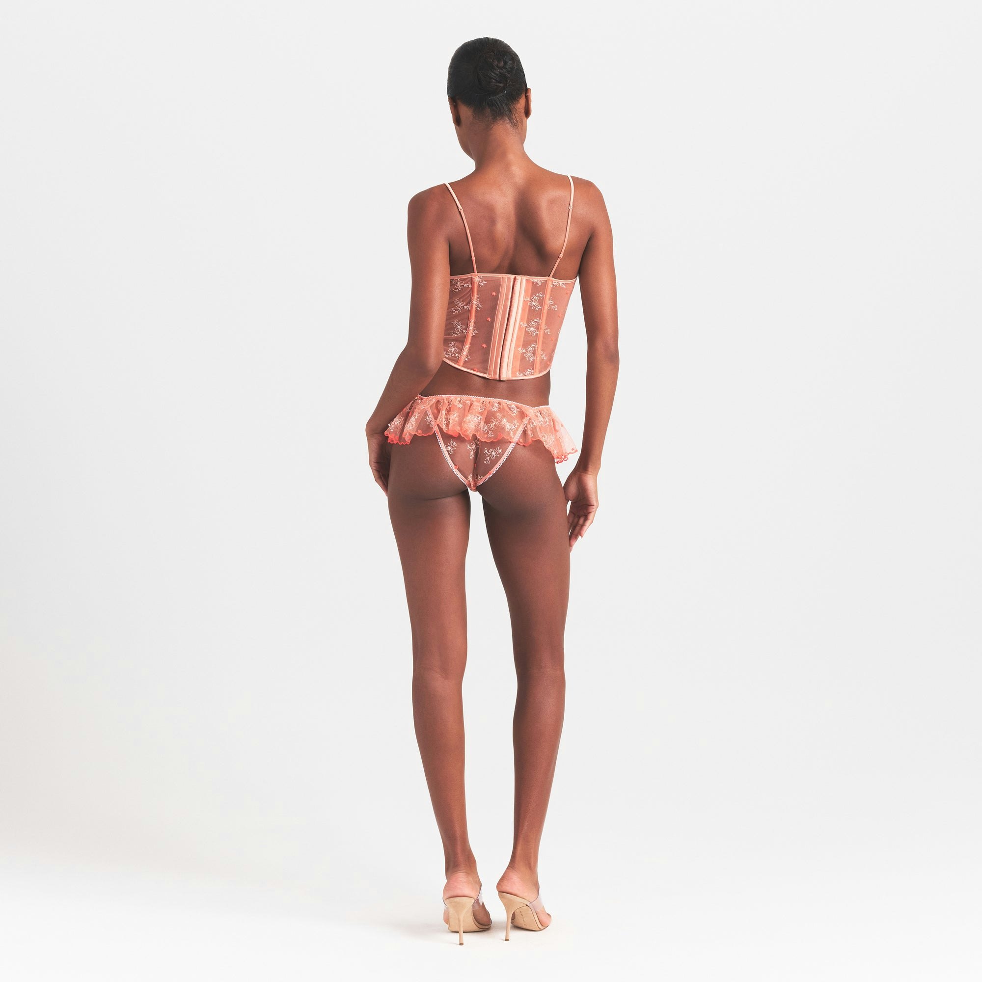 EMBROIDERED TULLE CORSET | GUAVA HEART TULLE ON A MODEL FRONT VIEW @ | FOCUS: 0.0, 1.0, 0.9