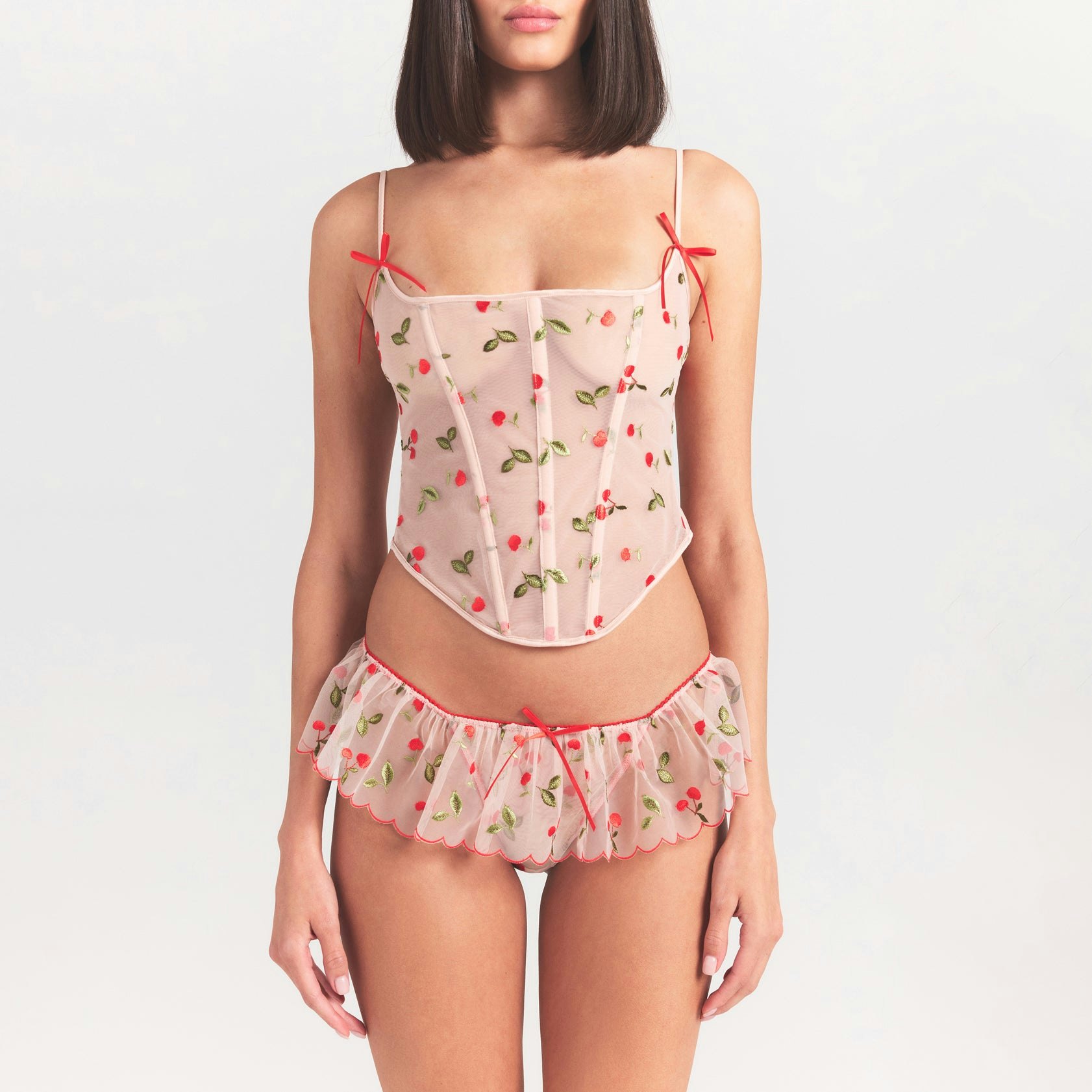 EMBROIDERED TULLE CORSET | PRIMROSE CHERRY TULLE ON A MODEL SIDE VIEW @ | FOCUS: 0.0, 1.0, 0.9