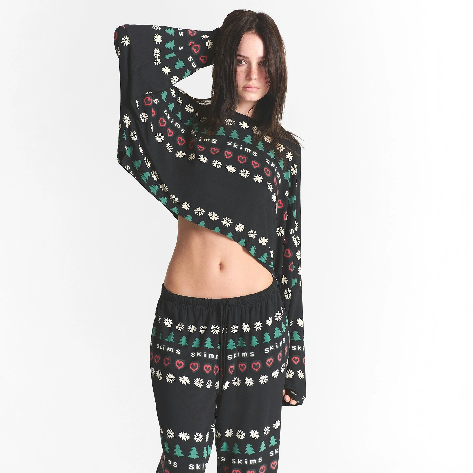 CACTUS PLANT FLEA MARKET X SKIMS SKIMS SLEEP CROPPED LONG SLEEVE AND PANT SET | ONYX PINE FAIR ISLE ON A MODEL FRONT VIEW @ | FOCUS: 0.0, 1.0, 0.9