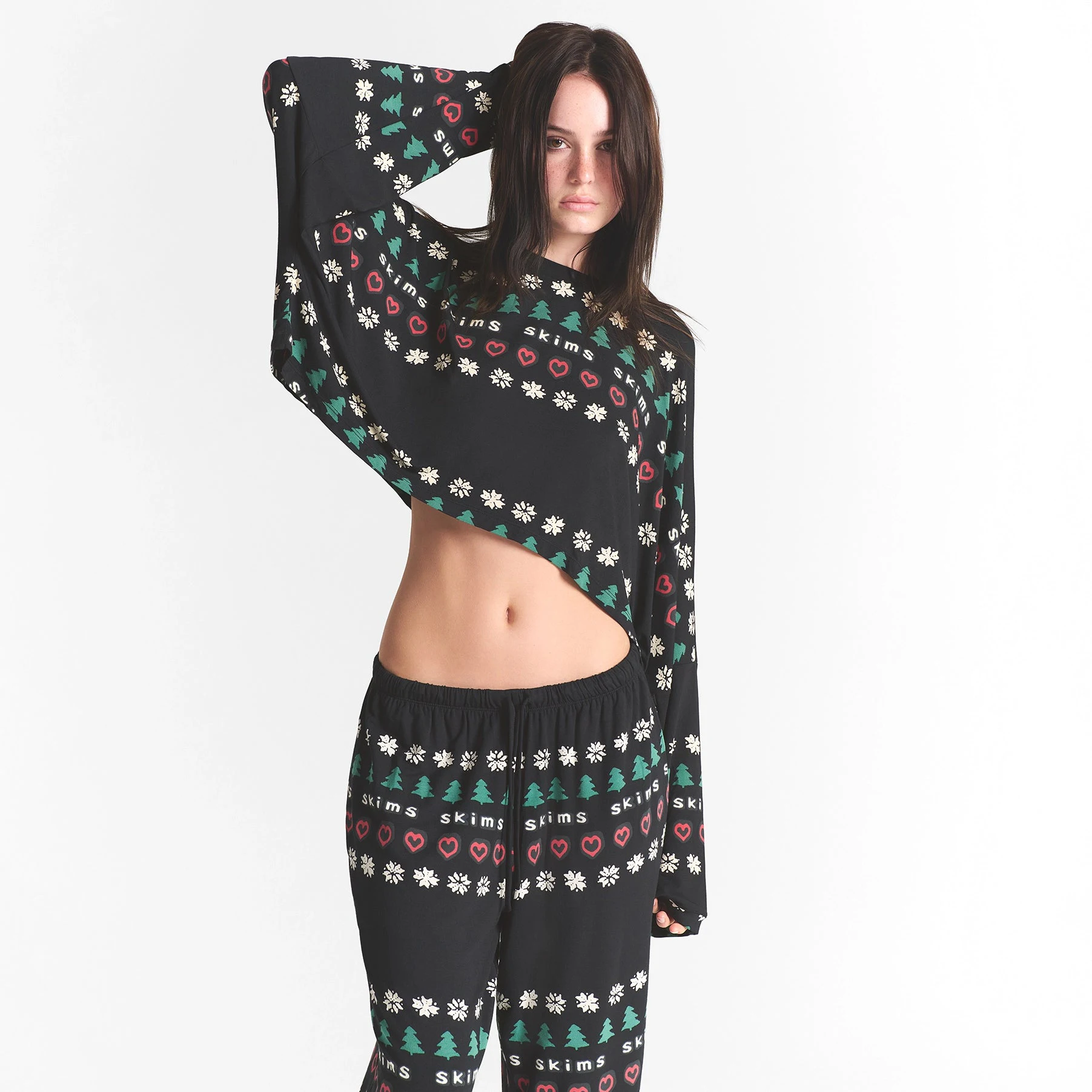 CACTUS PLANT FLEA MARKET X SKIMS SKIMS SLEEP CROPPED LONG SLEEVE AND PANT SET | ONYX PINE FAIR ISLE ON A MODEL FRONT VIEW @ | FOCUS: 0.0, 1.0, 0.9