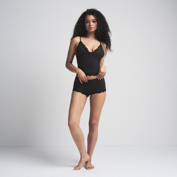 FITS EVERYBODY LACE TRIANGLE CAMI AND BOY SHORT SET | ONYX (BOY SHORTS) ON A MODEL FRONT VIEW | FOCUS: 0.0, 1.0, 0.9